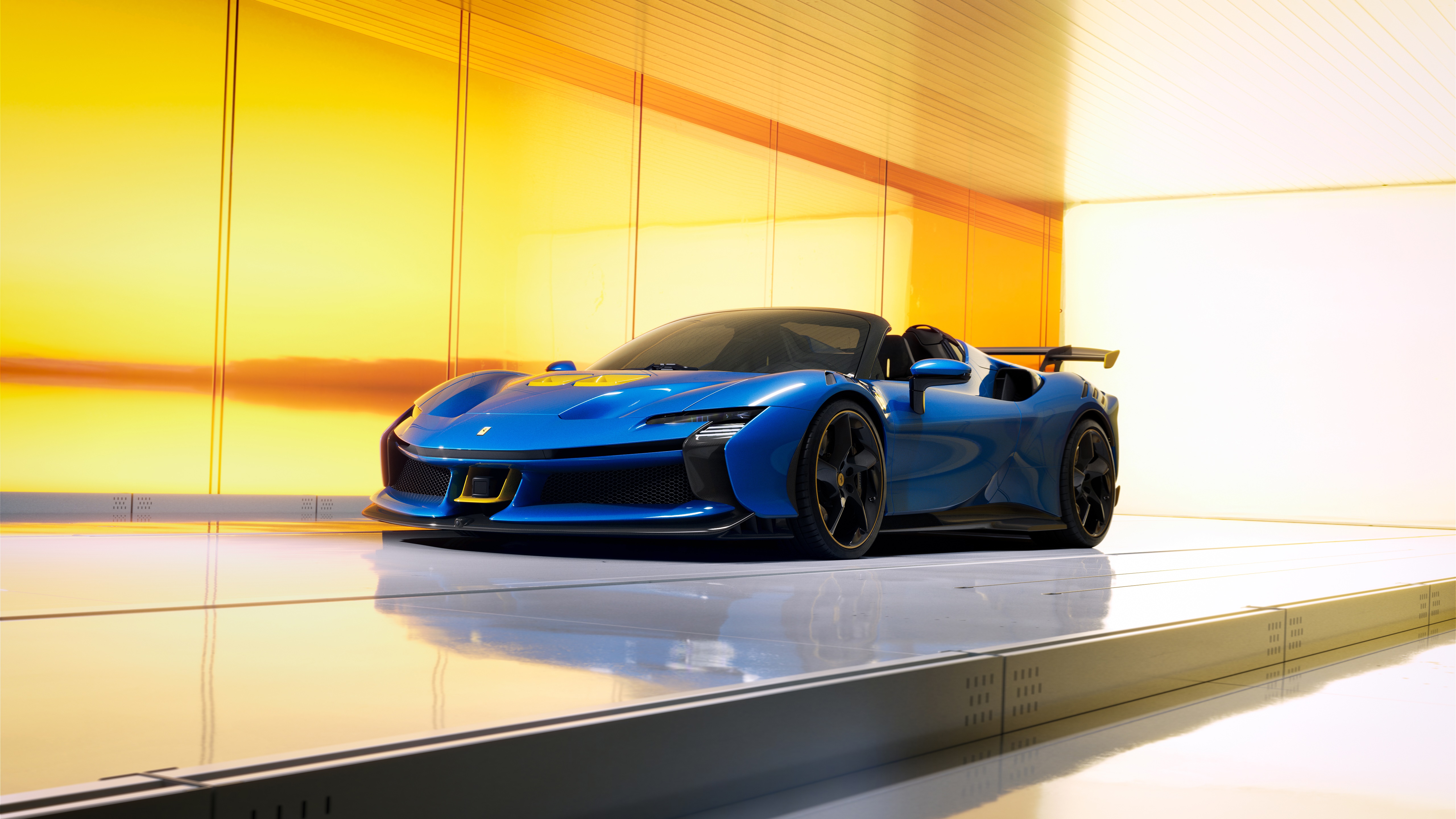 Blue Ferrari SF90 XX Spider in a modern showroom HD Wallpaper