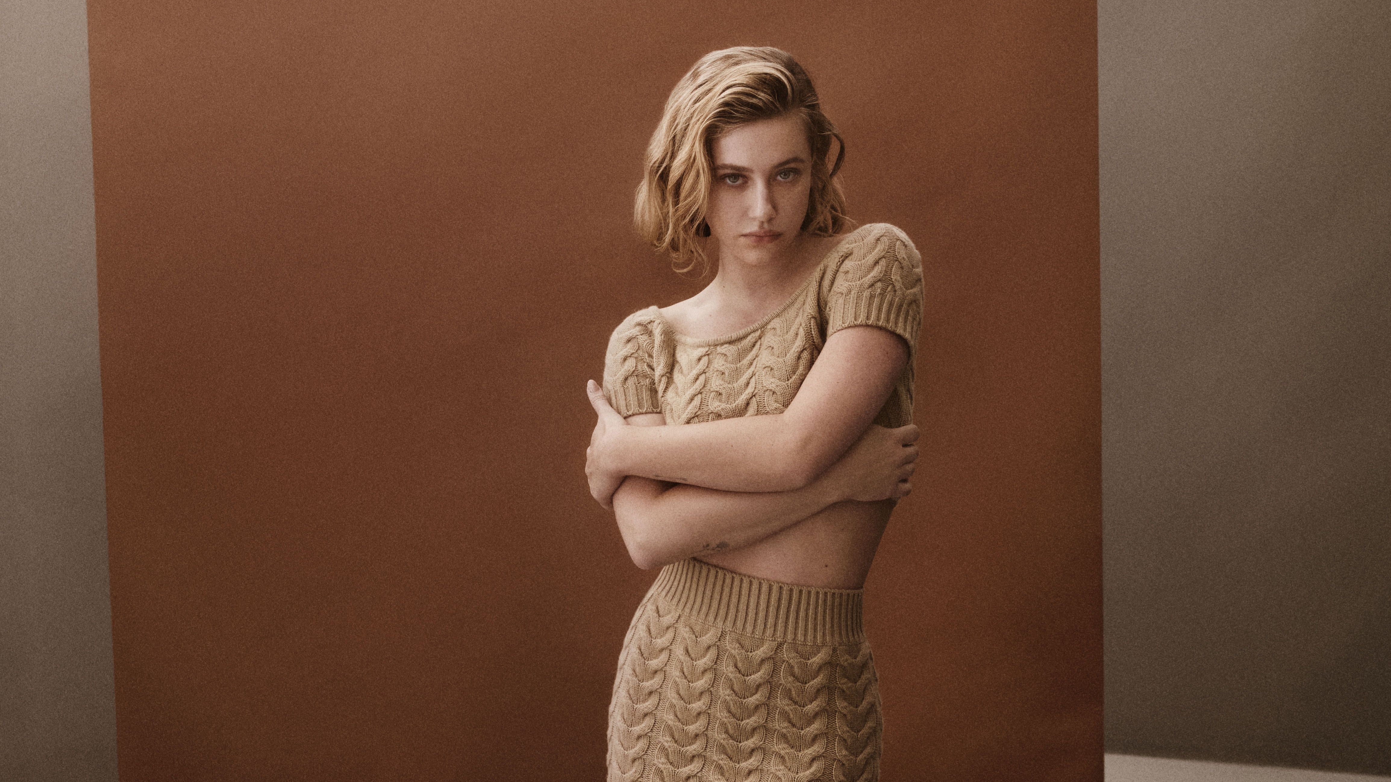 Lili Reinhart in a knitted outfit HD Wallpaper