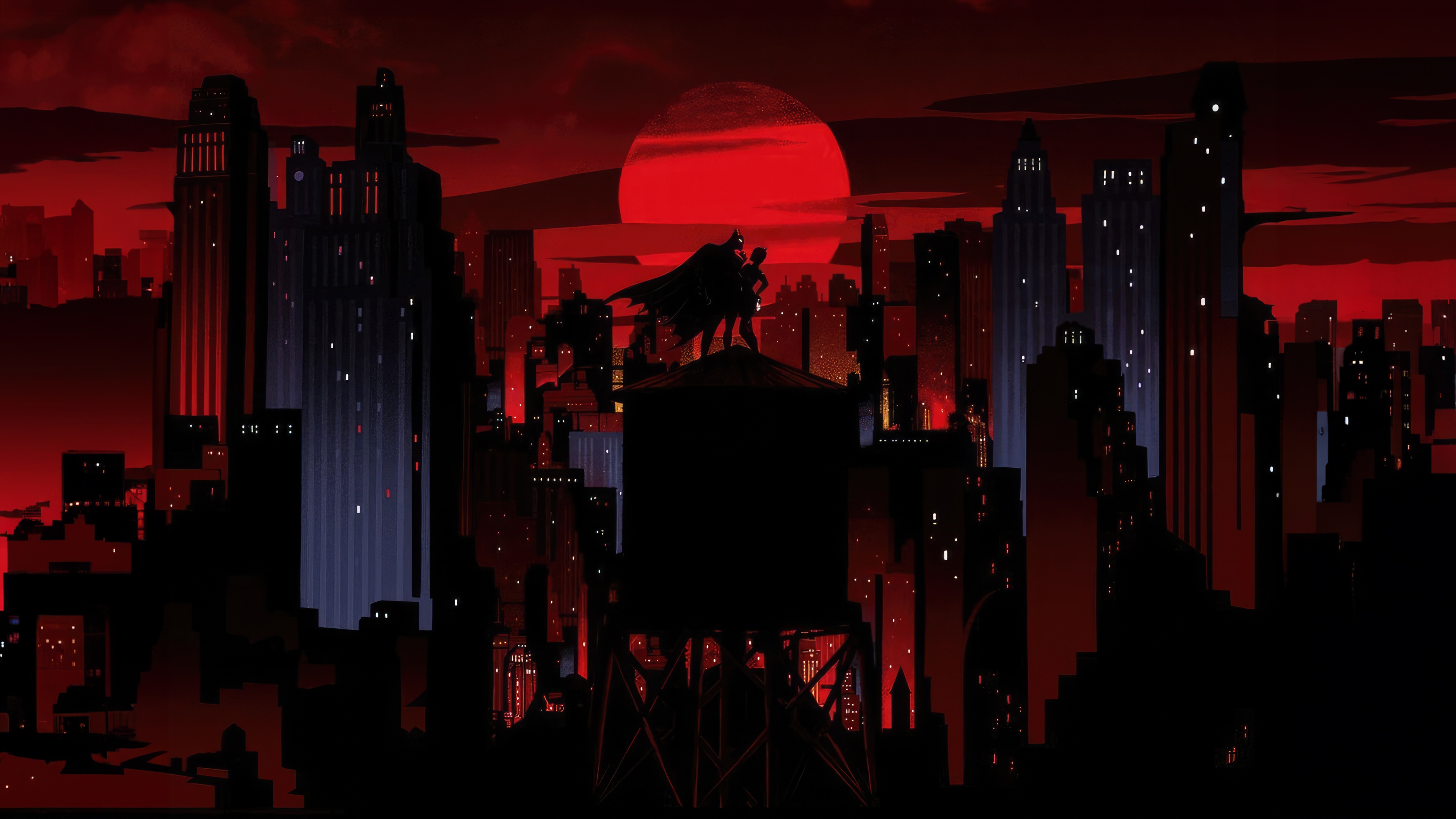 Batman and Robin silhouette against a red sun over a city HD Wallpaper