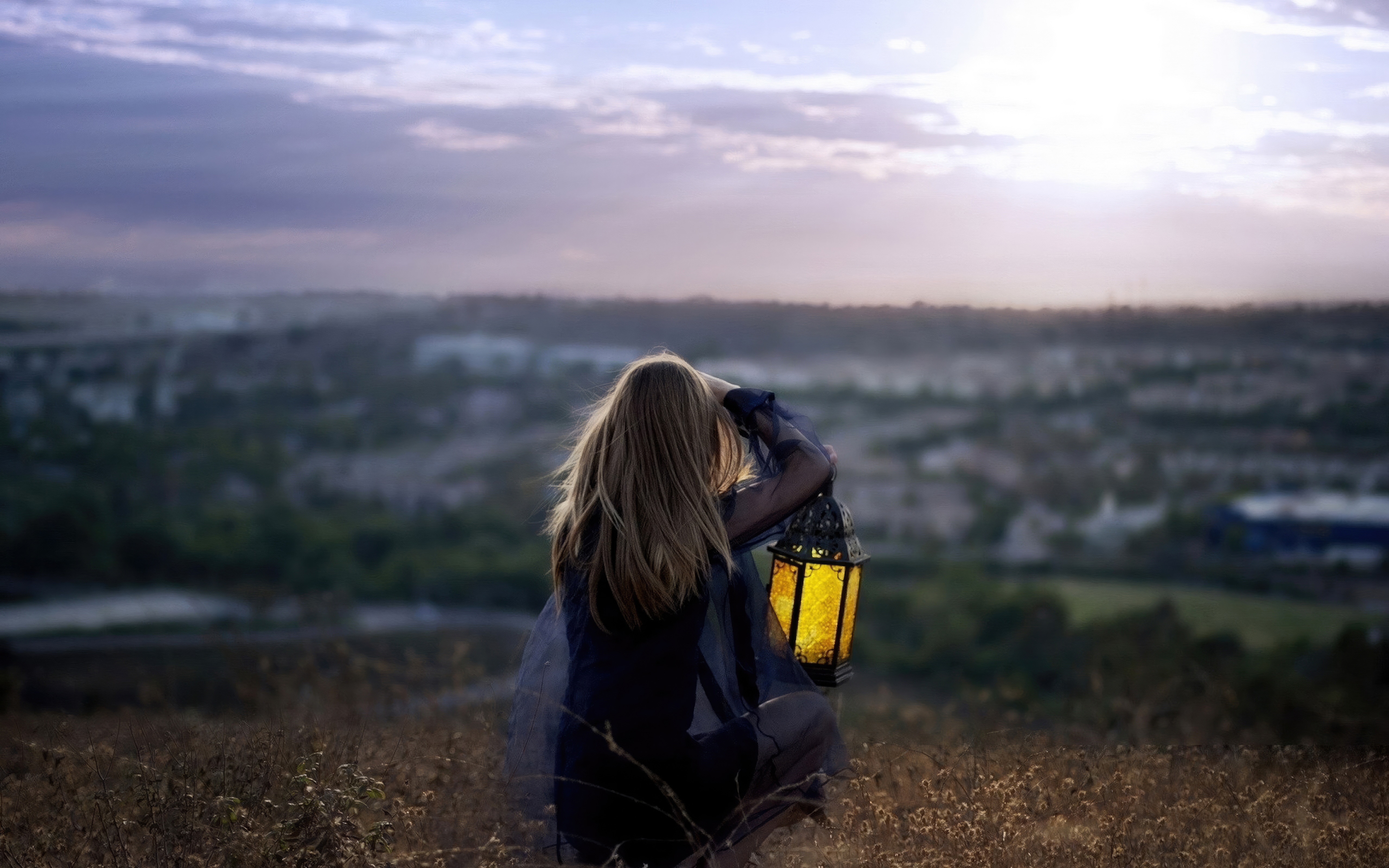 Girl with lantern at sunset HD Wallpaper