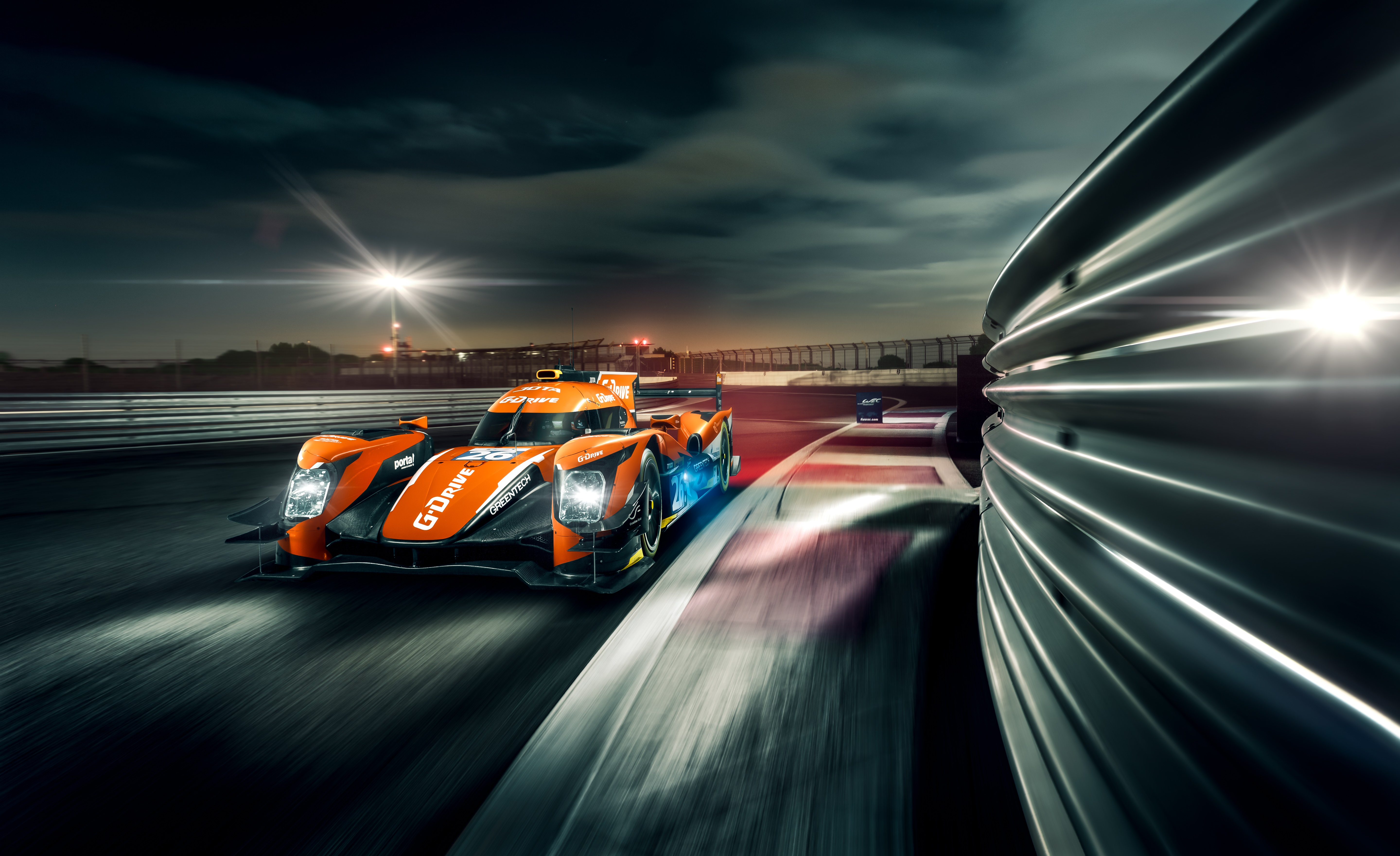 G-Drive Racing car on a track at night HD Wallpaper