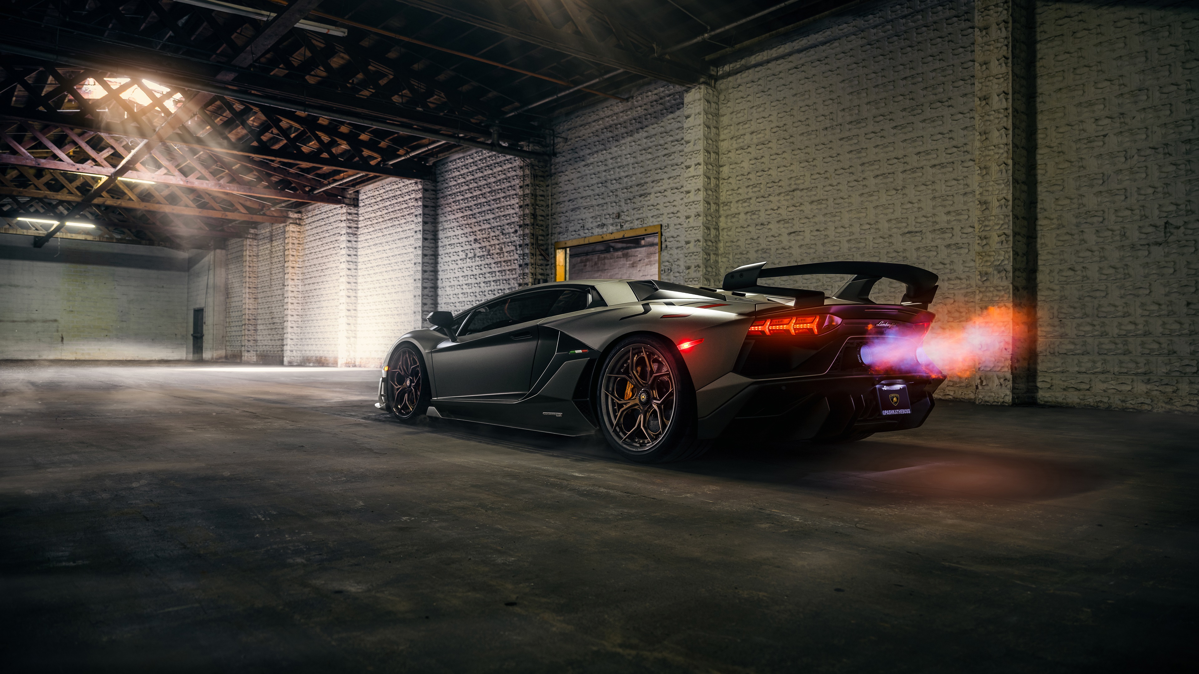 Lamborghini Aventador SVJ exhaust flames in garage HD Wallpaper