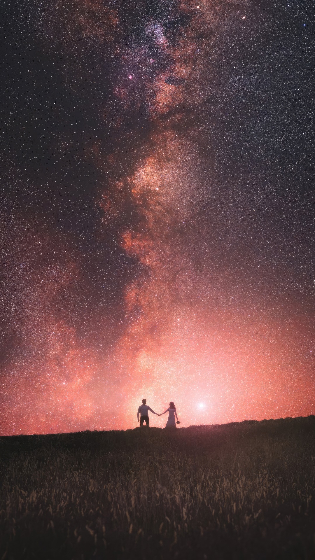 Couple holding hands under the Milky Way HD Phone Wallpaper