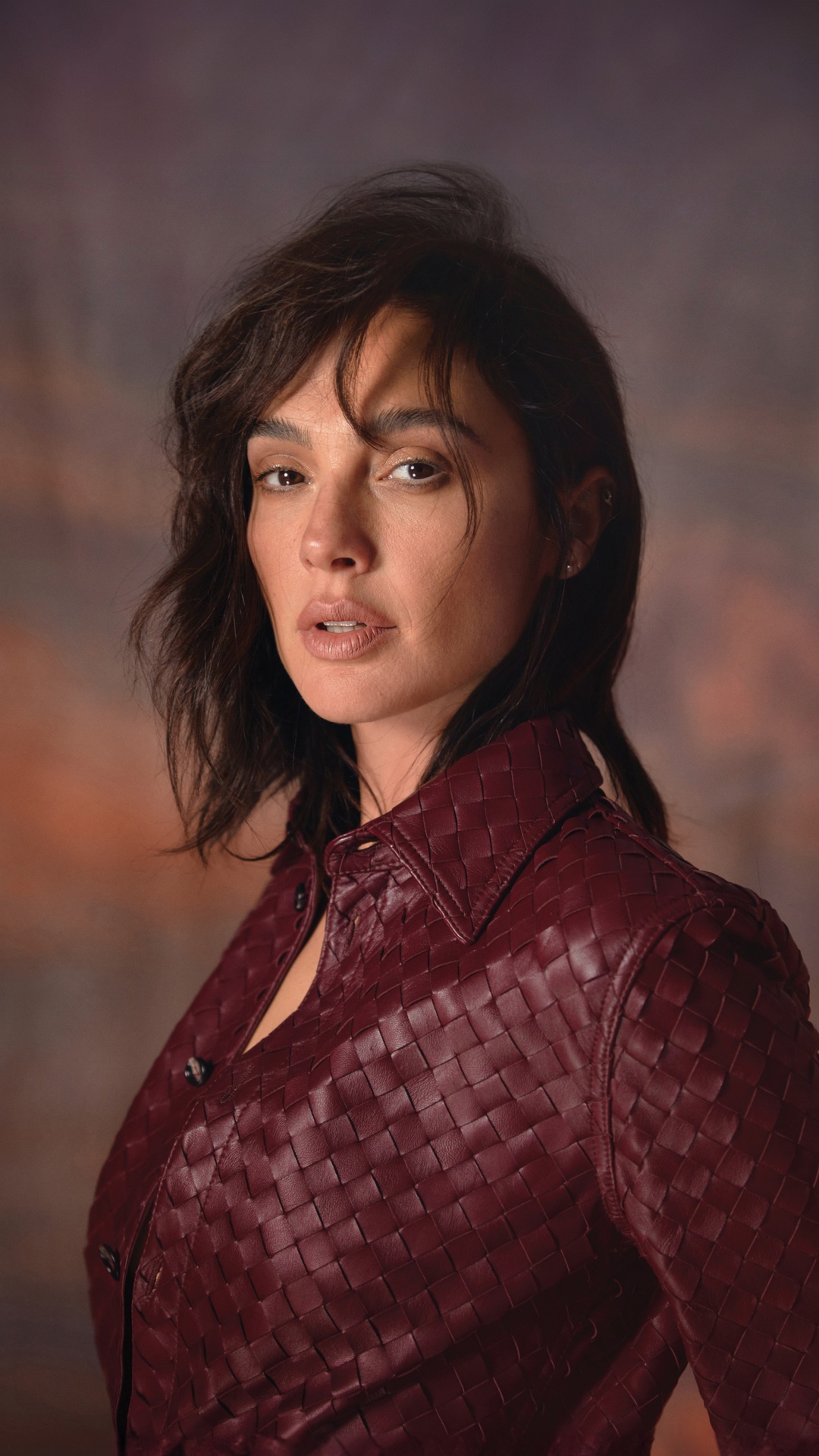 Gal Gadot in a maroon woven leather shirt HD Phone Wallpaper
