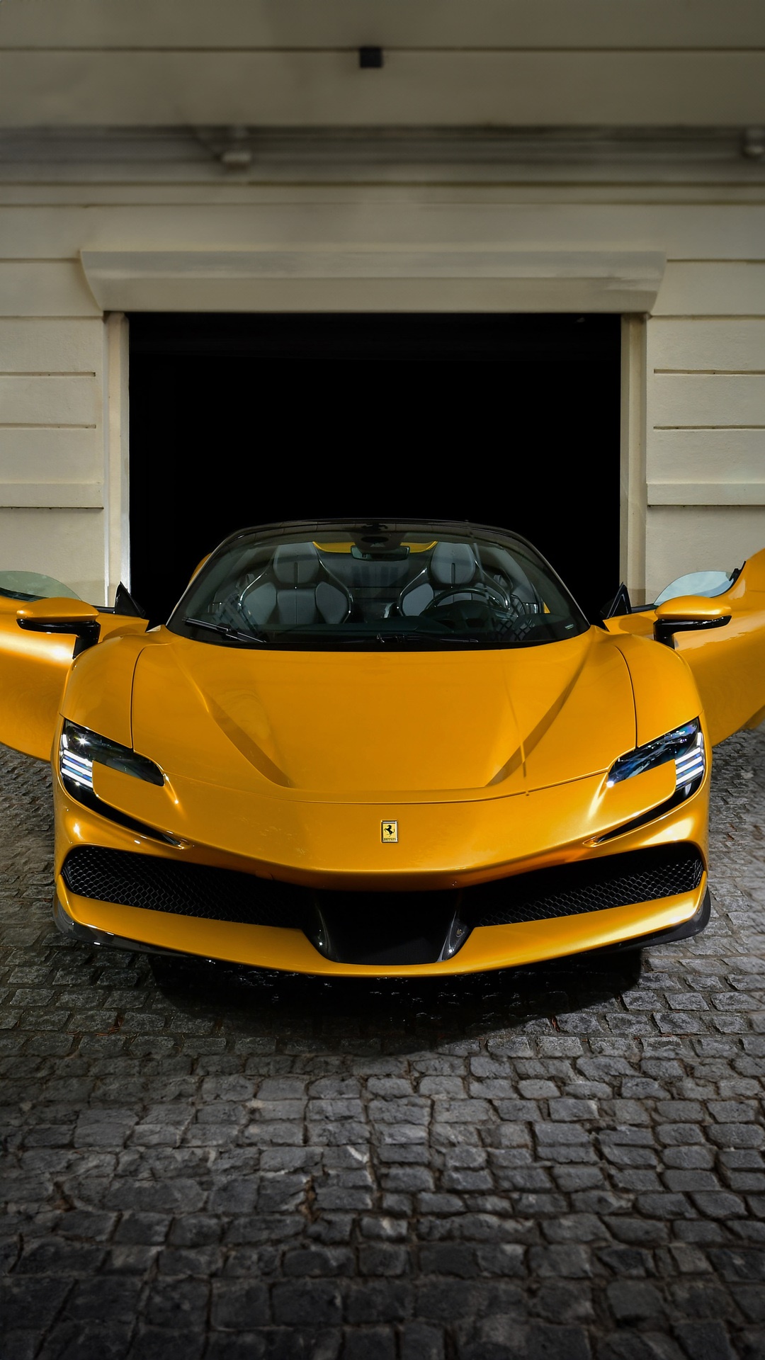Yellow Ferrari SF90 Spider parked in a garage HD Phone Wallpaper