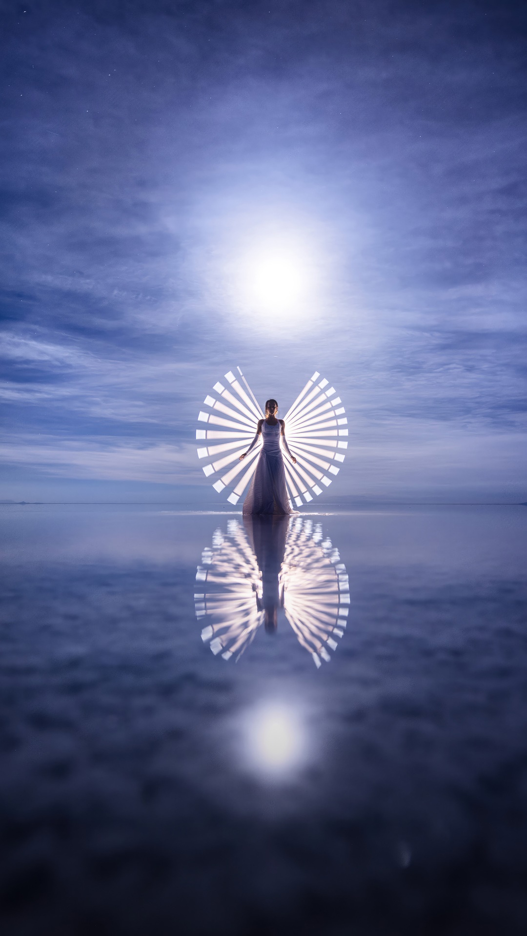 Woman with light wings reflected on water HD Phone Wallpaper