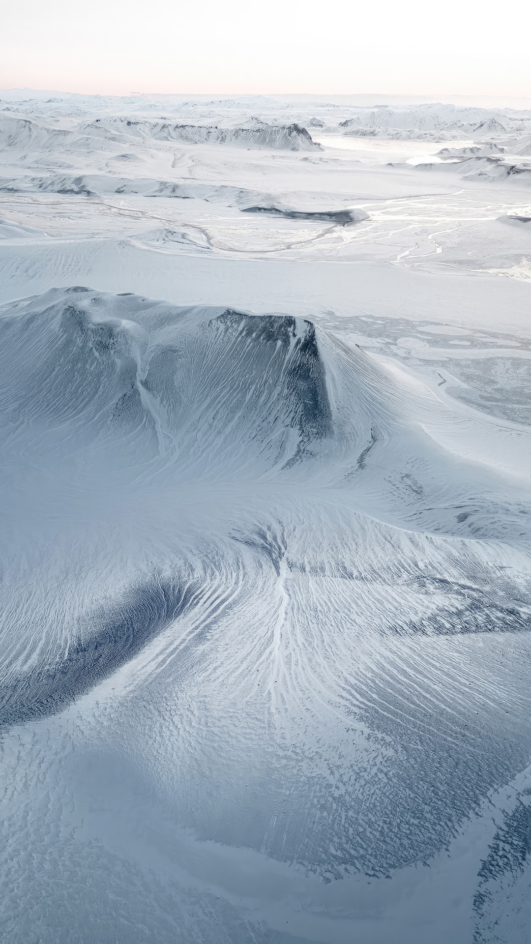 Snowy Icelandic landscape with mountains and rivers HD Phone Wallpaper
