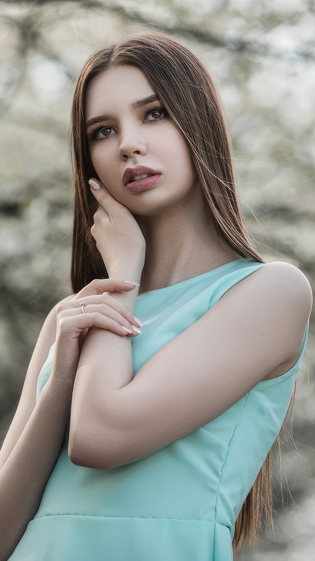 Young woman in a teal dress HD Phone Wallpaper