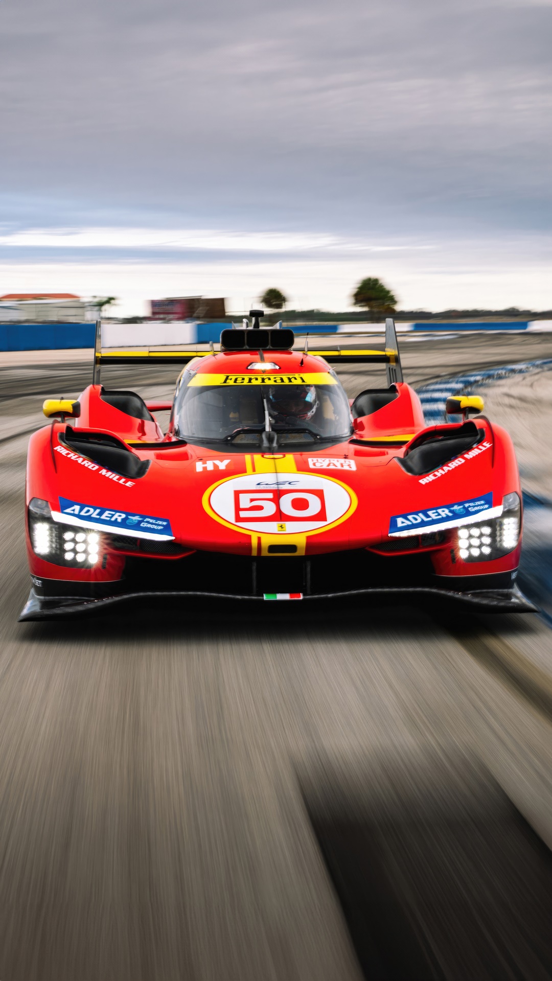 Ferrari 499P race car on track HD Phone Wallpaper