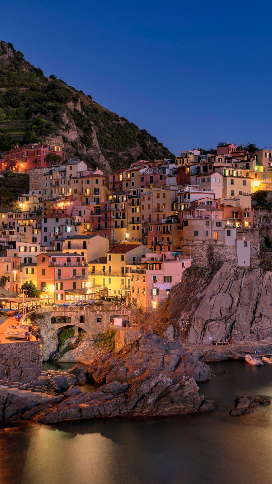 Colorful Italian village on a rocky coast at dusk HD Phone Wallpaper