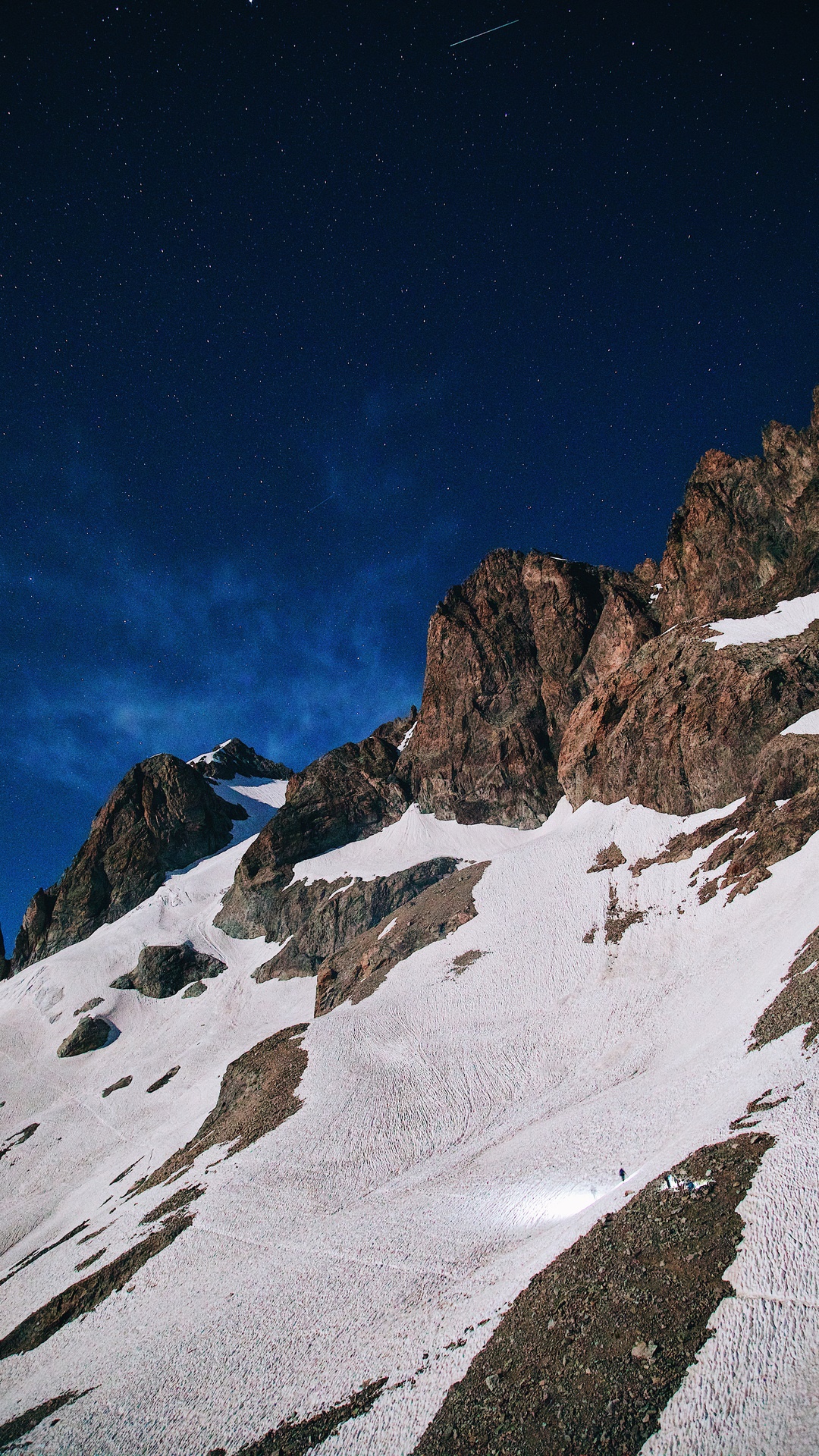 Snowy mountains under a starry night sky HD Phone Wallpaper