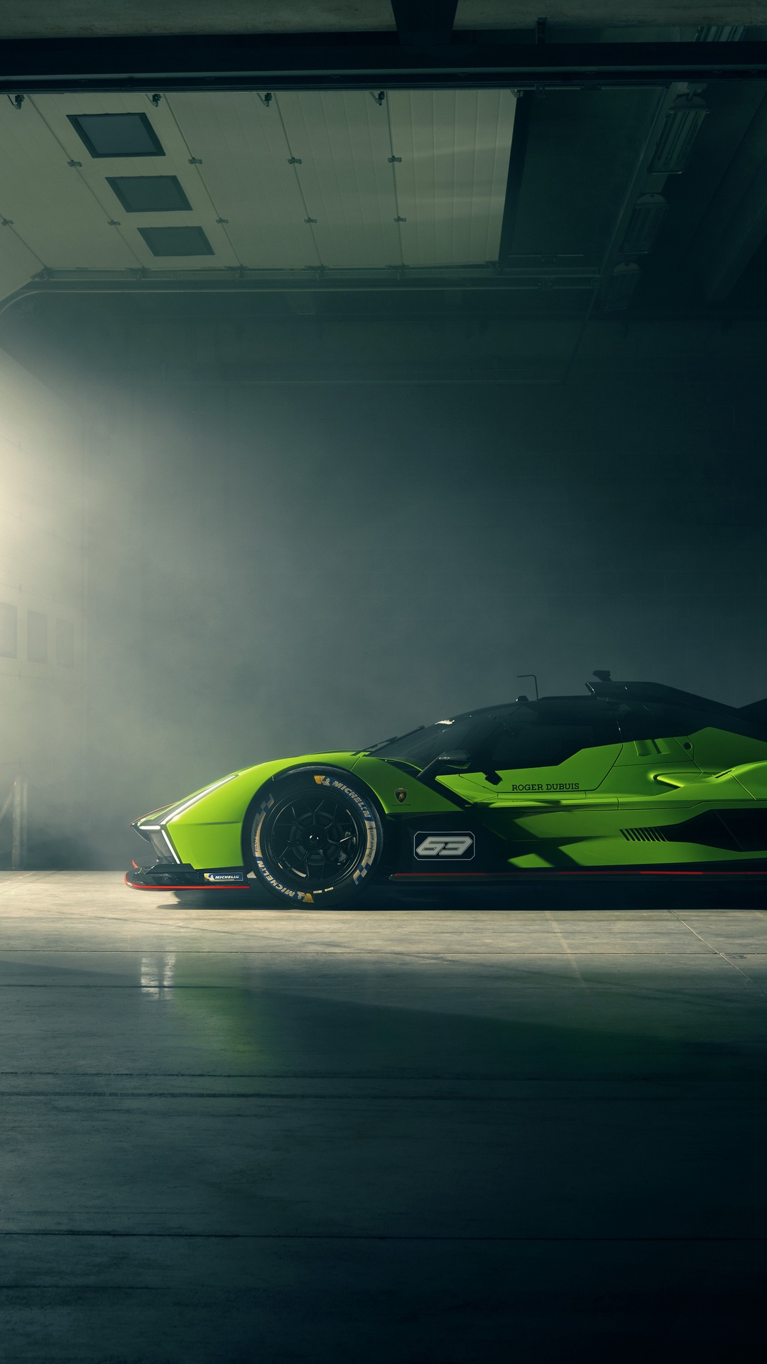 Lamborghini SC63 race car in a garage HD Phone Wallpaper
