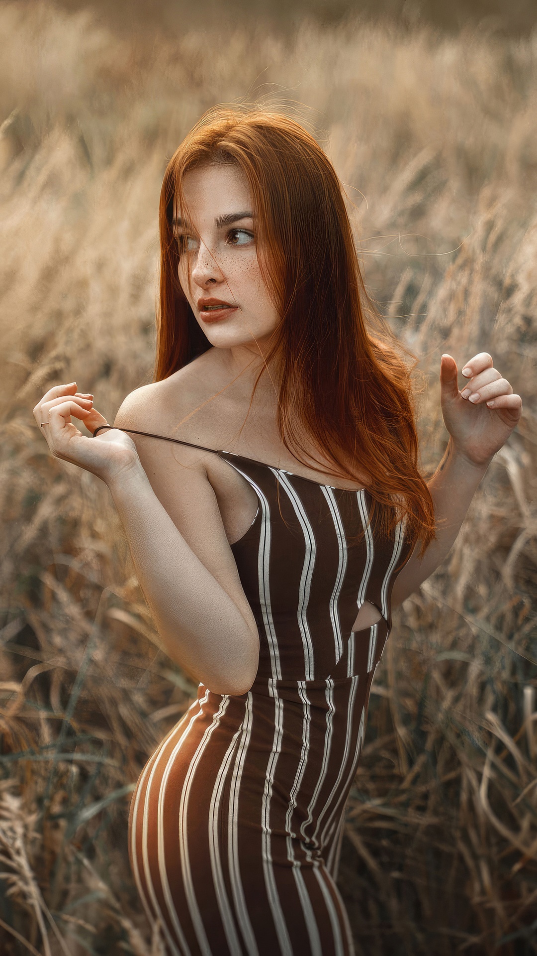 Redhead model in a striped dress in a field HD Phone Wallpaper