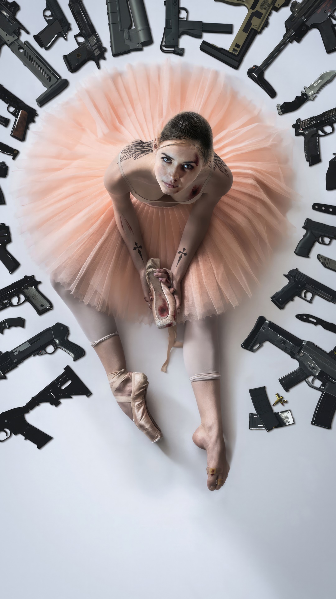 Ballerina surrounded by guns HD Phone Wallpaper