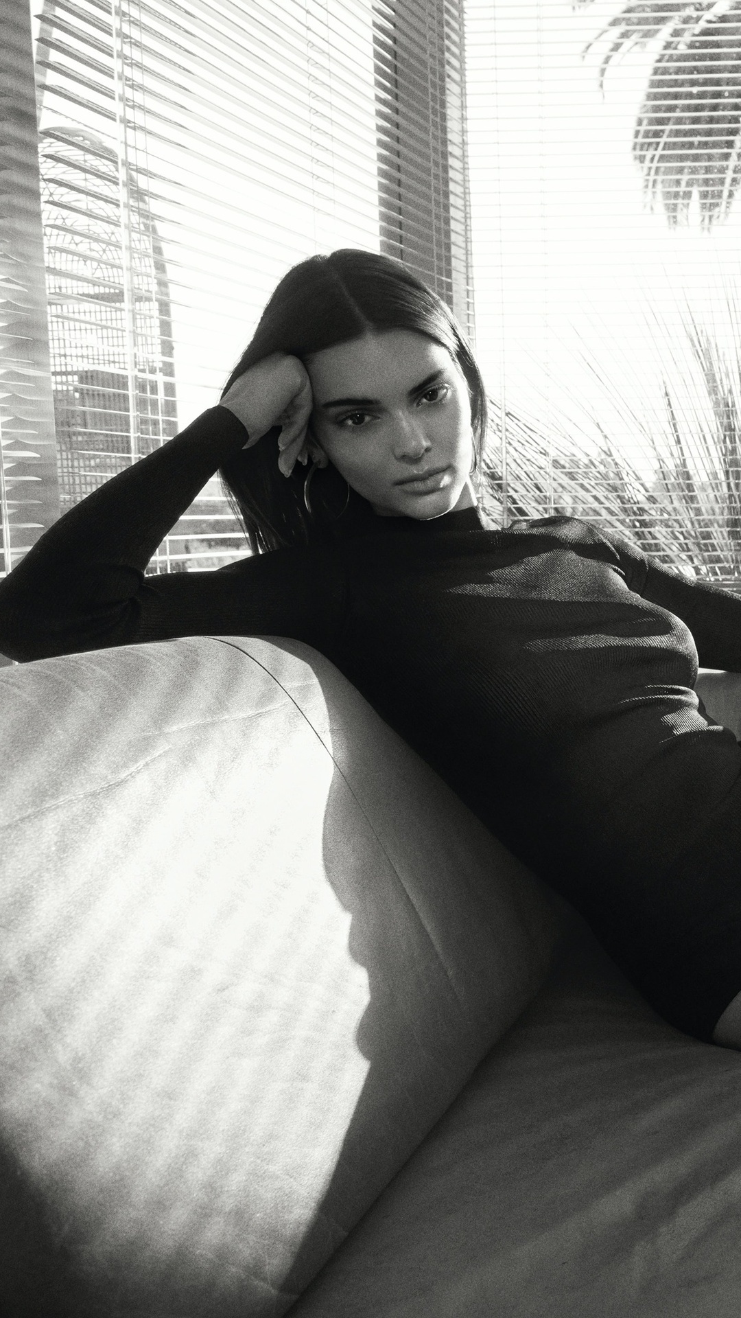 Kendall Jenner poses on a couch near blinds HD Phone Wallpaper