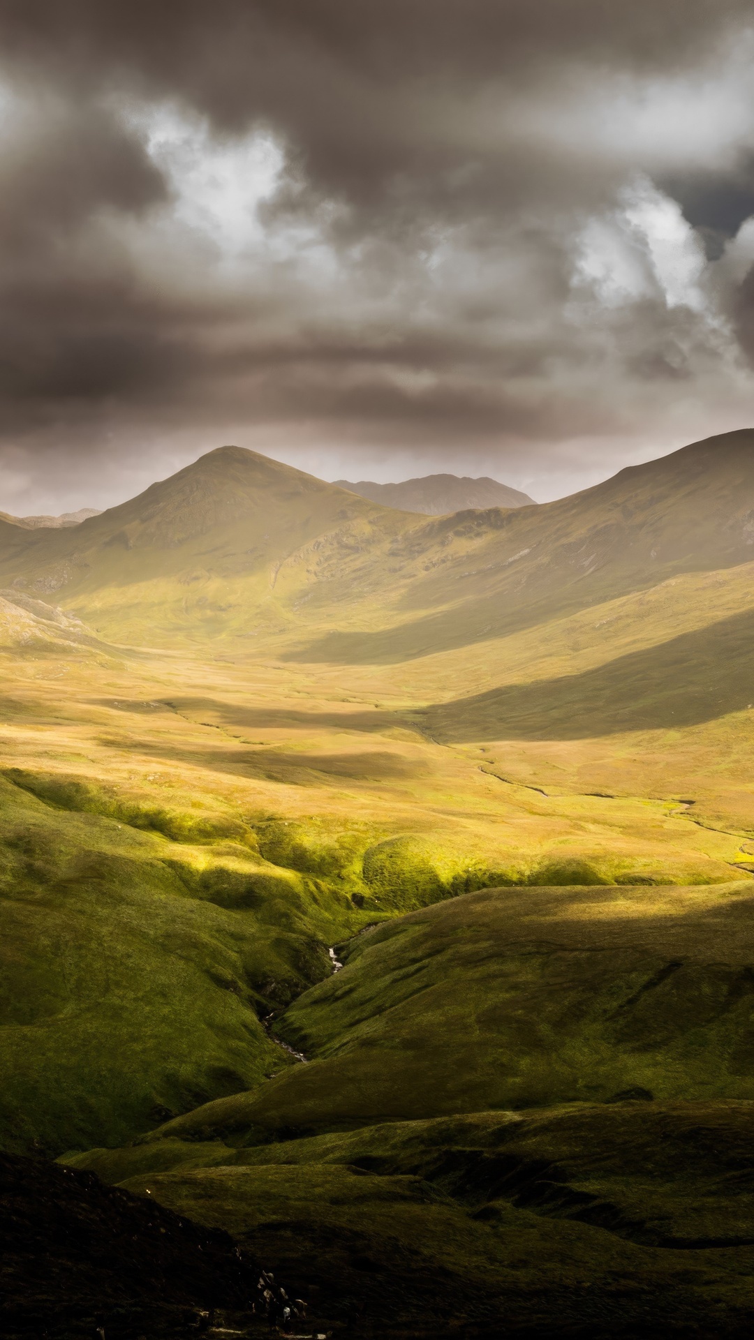 Dramatic landscape of a national park with mountains and clouds HD Phone Wallpaper