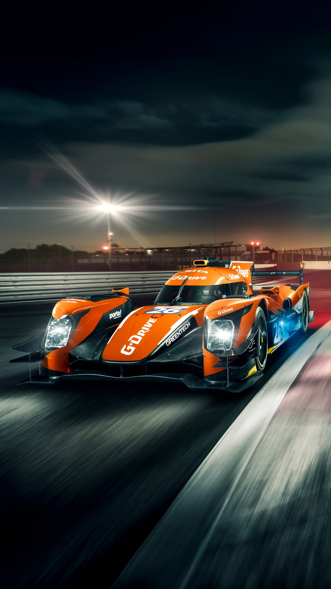 G-Drive Racing Car on Track at Night HD Phone Wallpaper