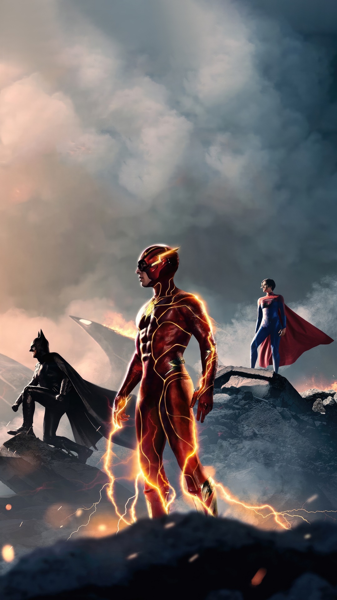 The Flash, Batman, and Superman in a dramatic scene HD Phone Wallpaper
