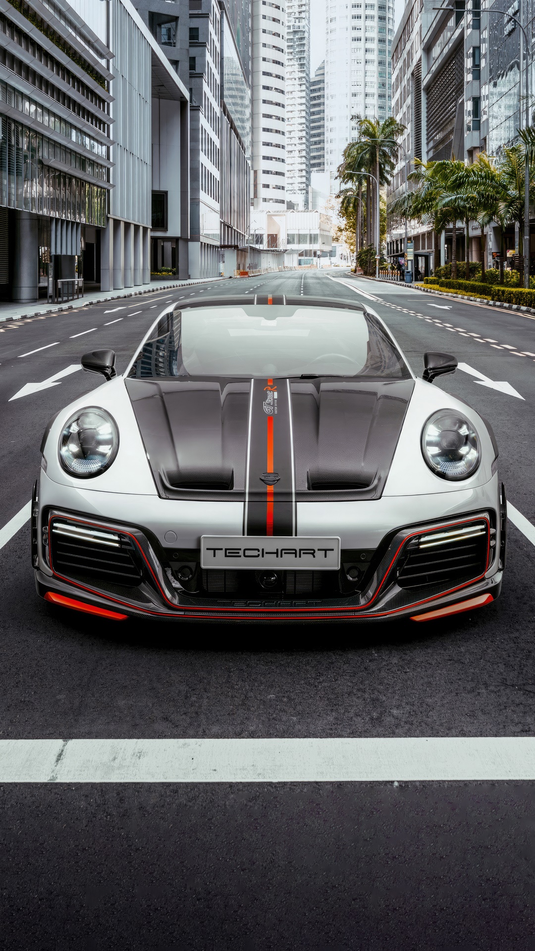 Techart Porsche 992 on a city street HD Phone Wallpaper