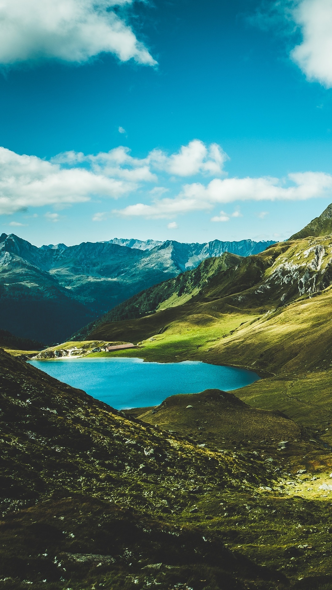 Mountains and a lake in a scenic landscape HD Phone Wallpaper