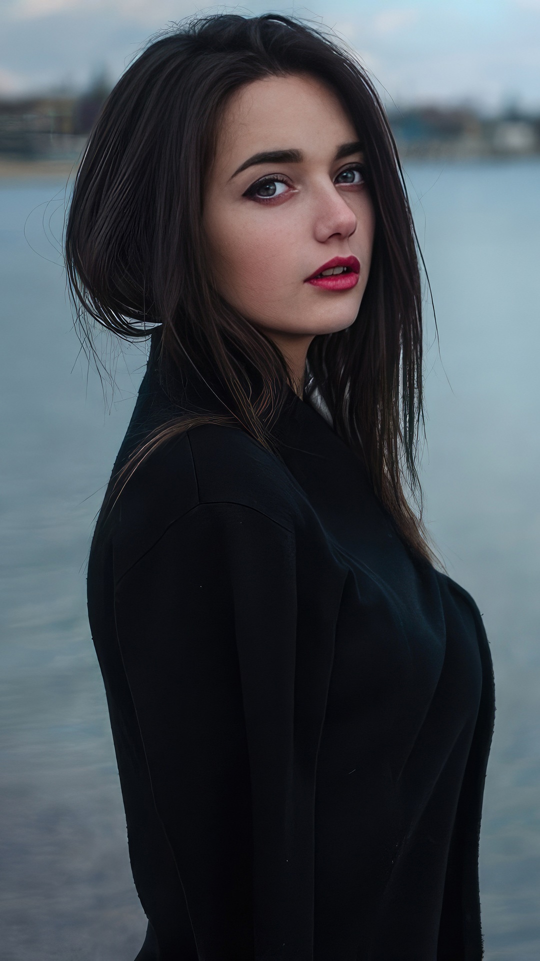 Woman in black dress by the water HD Phone Wallpaper