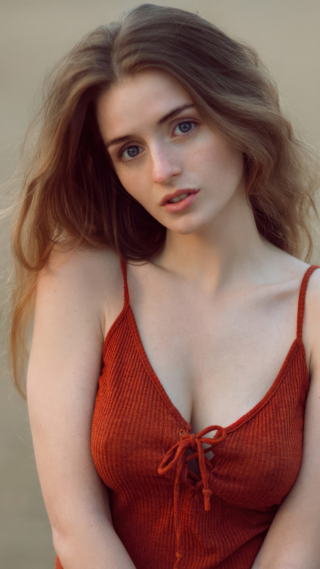 Young woman with blonde hair and blue eyes HD Phone Wallpaper