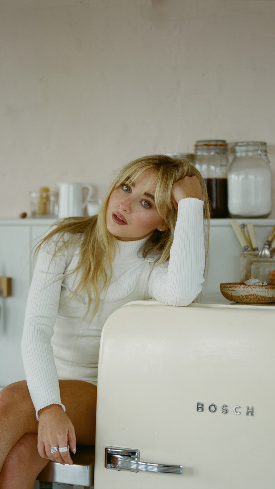 Sabrina Carpenter in a kitchen photoshoot HD Phone Wallpaper