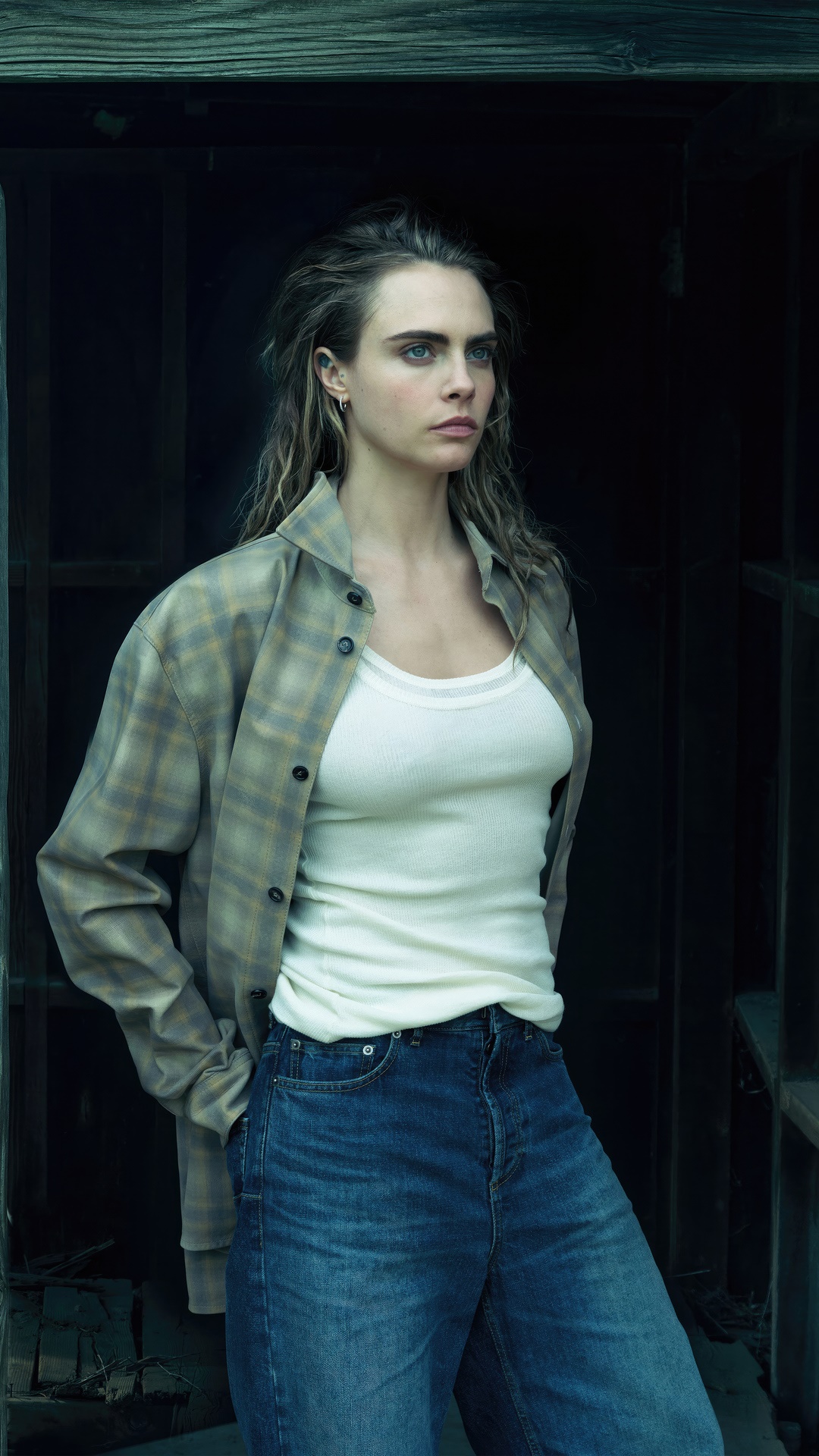 Cara Delevingne in a plaid shirt and jeans HD Phone Wallpaper