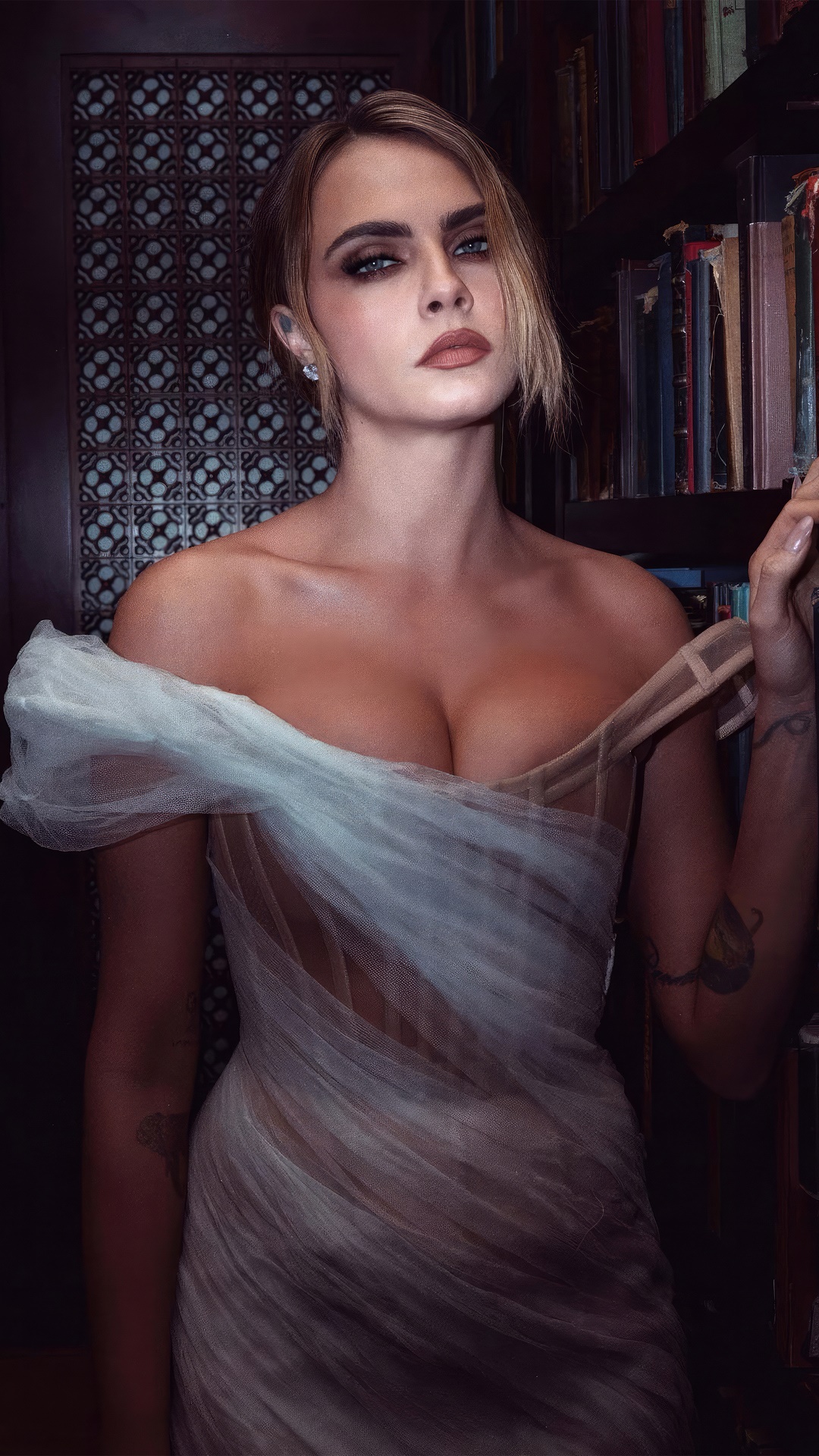 Cara Delevingne in a sheer dress HD Phone Wallpaper