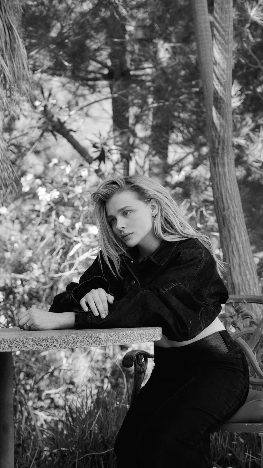 Chloe Grace Moretz in a black denim jacket and jeans HD Phone Wallpaper
