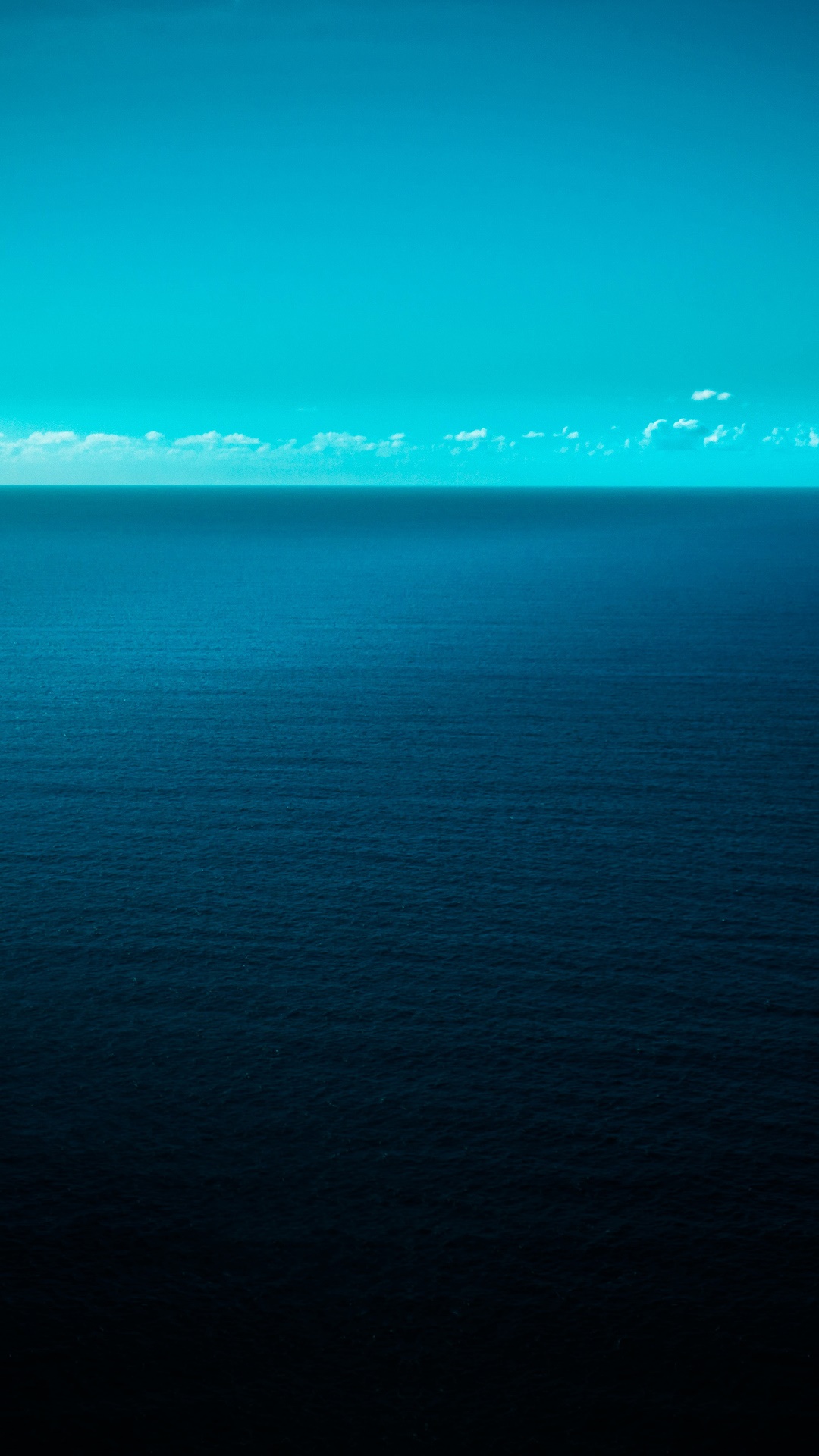 Vast ocean under a bright blue sky HD Phone Wallpaper
