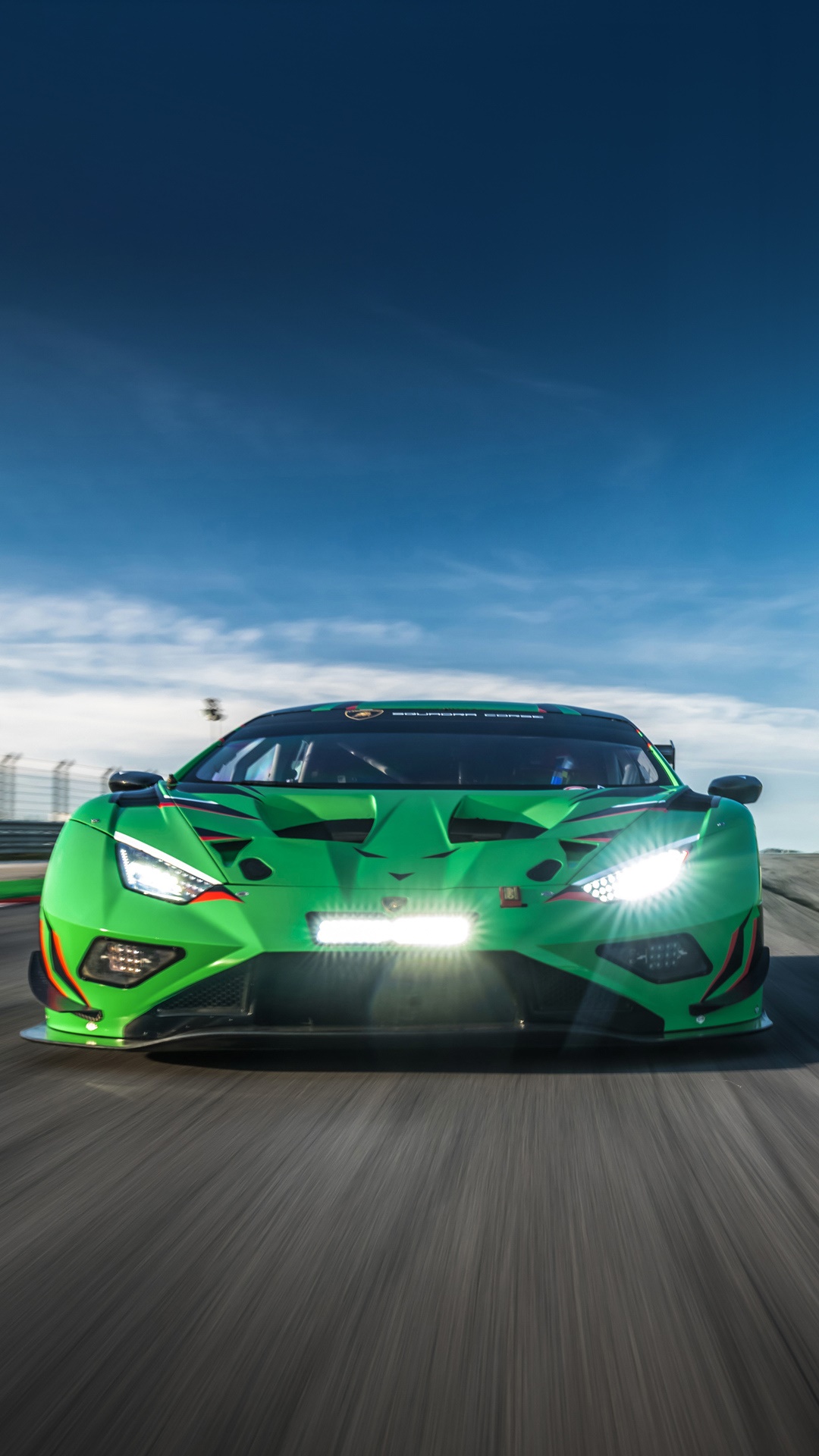 Green Lamborghini Huracan race car on track HD Phone Wallpaper