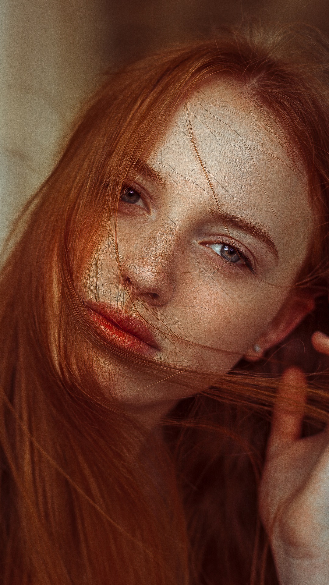 Redhead girl with freckles and windblown hair HD Phone Wallpaper