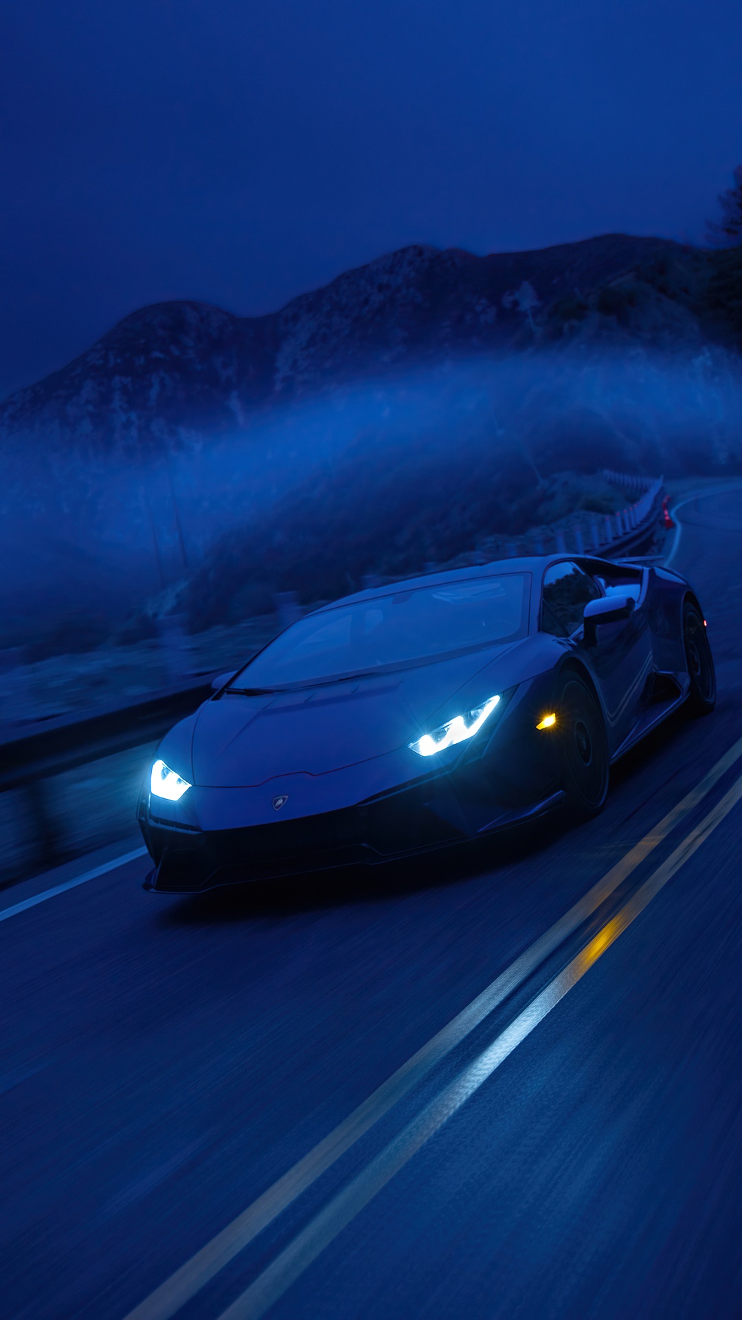 Lamborghini Aventador driving on a mountain road at night HD Phone Wallpaper