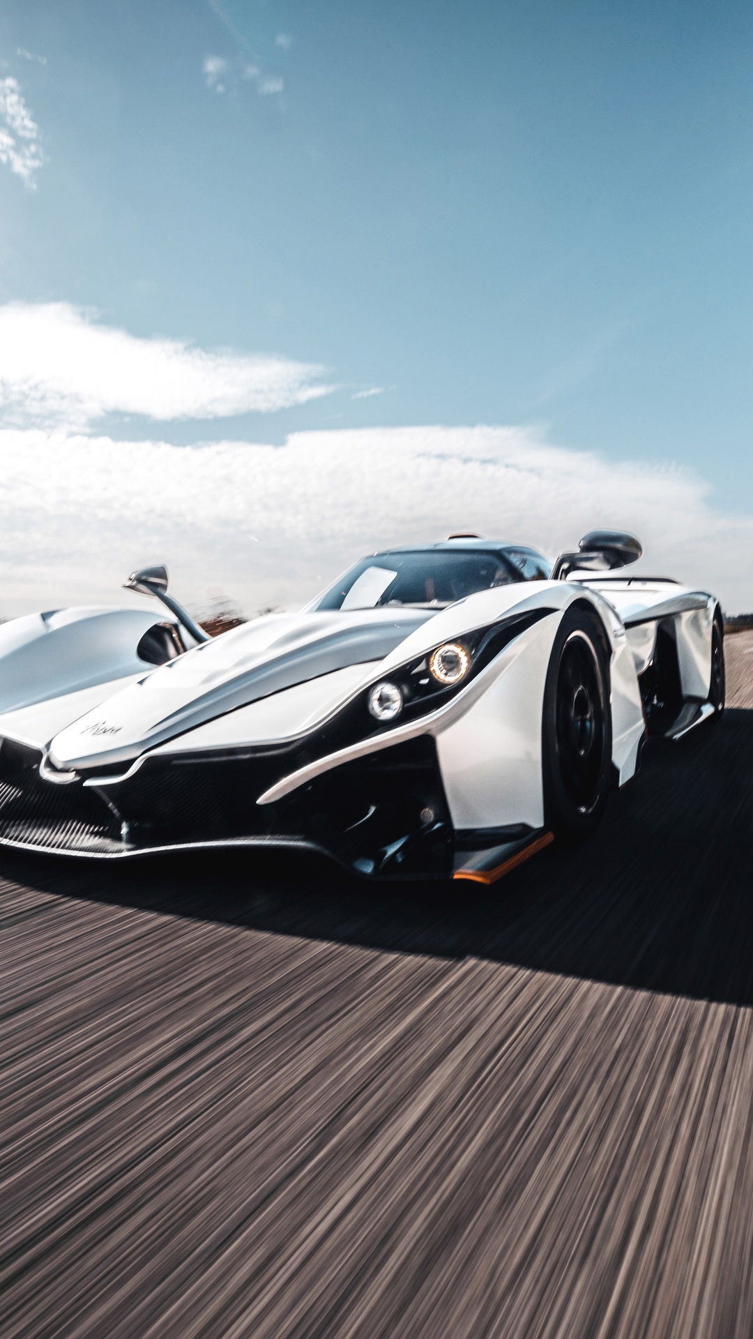 Praga Bohema supercar driving on a road HD Phone Wallpaper