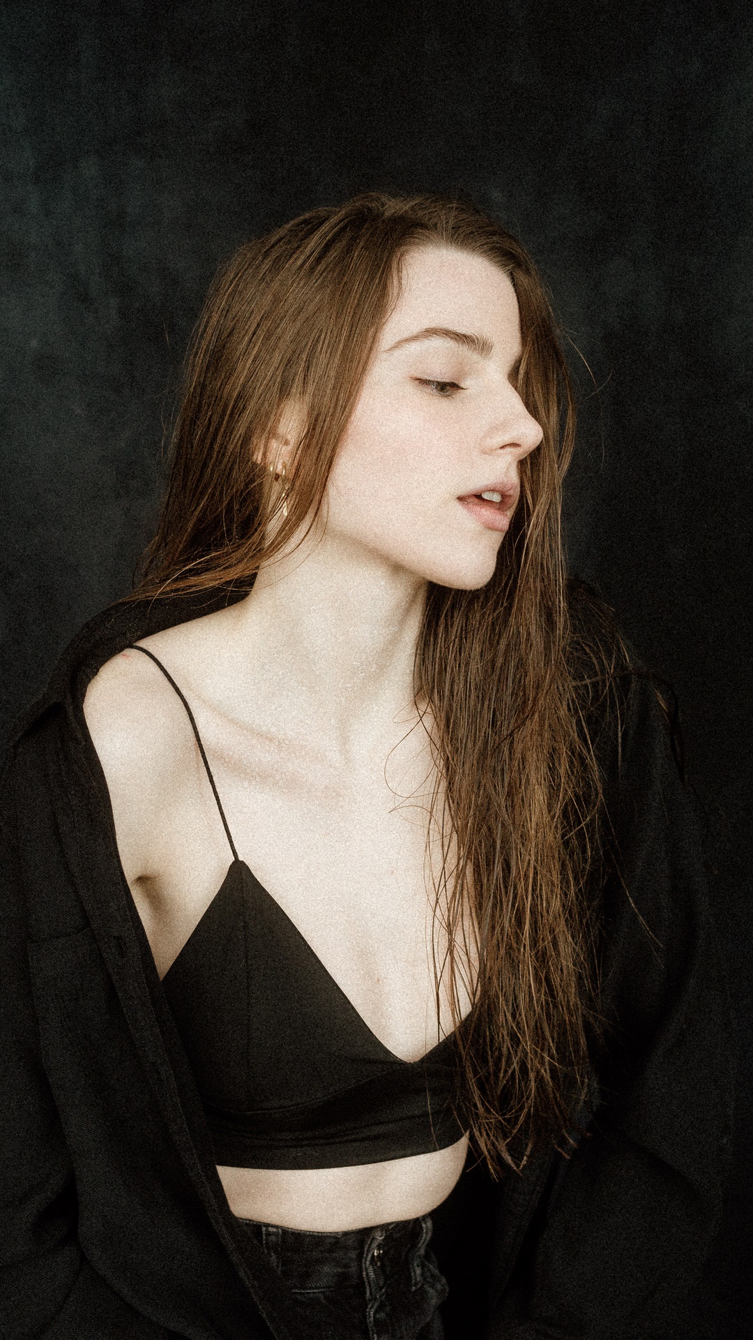 Model with long brown hair wearing a black top HD Phone Wallpaper