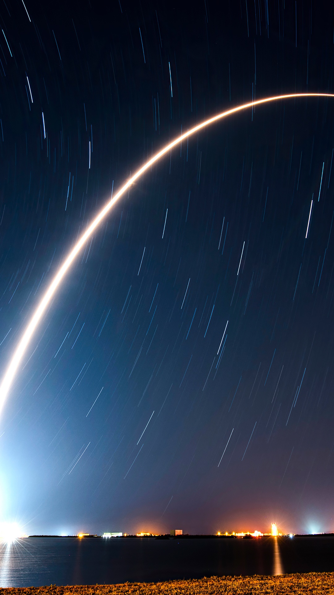 SpaceX Rocket Launch Trail Over Water at Night HD Phone Wallpaper