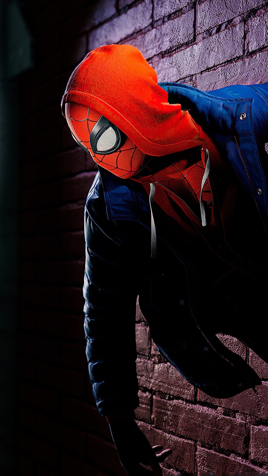 Spider-Man Miles Morales leaning on a brick wall HD Phone Wallpaper