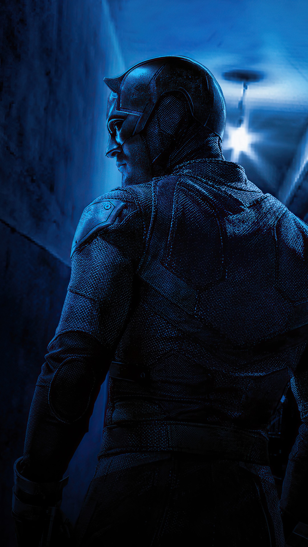 Daredevil in a dark hallway 4K HD Phone Wallpaper