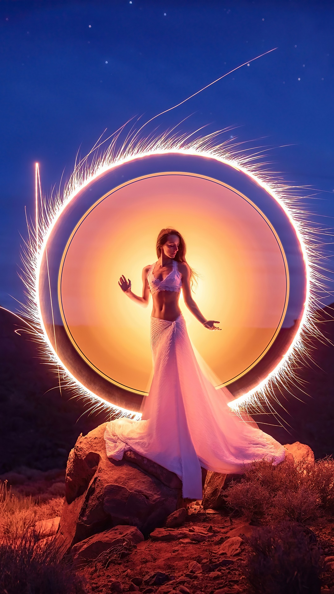 Woman in white dress in a fiery circle HD Phone Wallpaper
