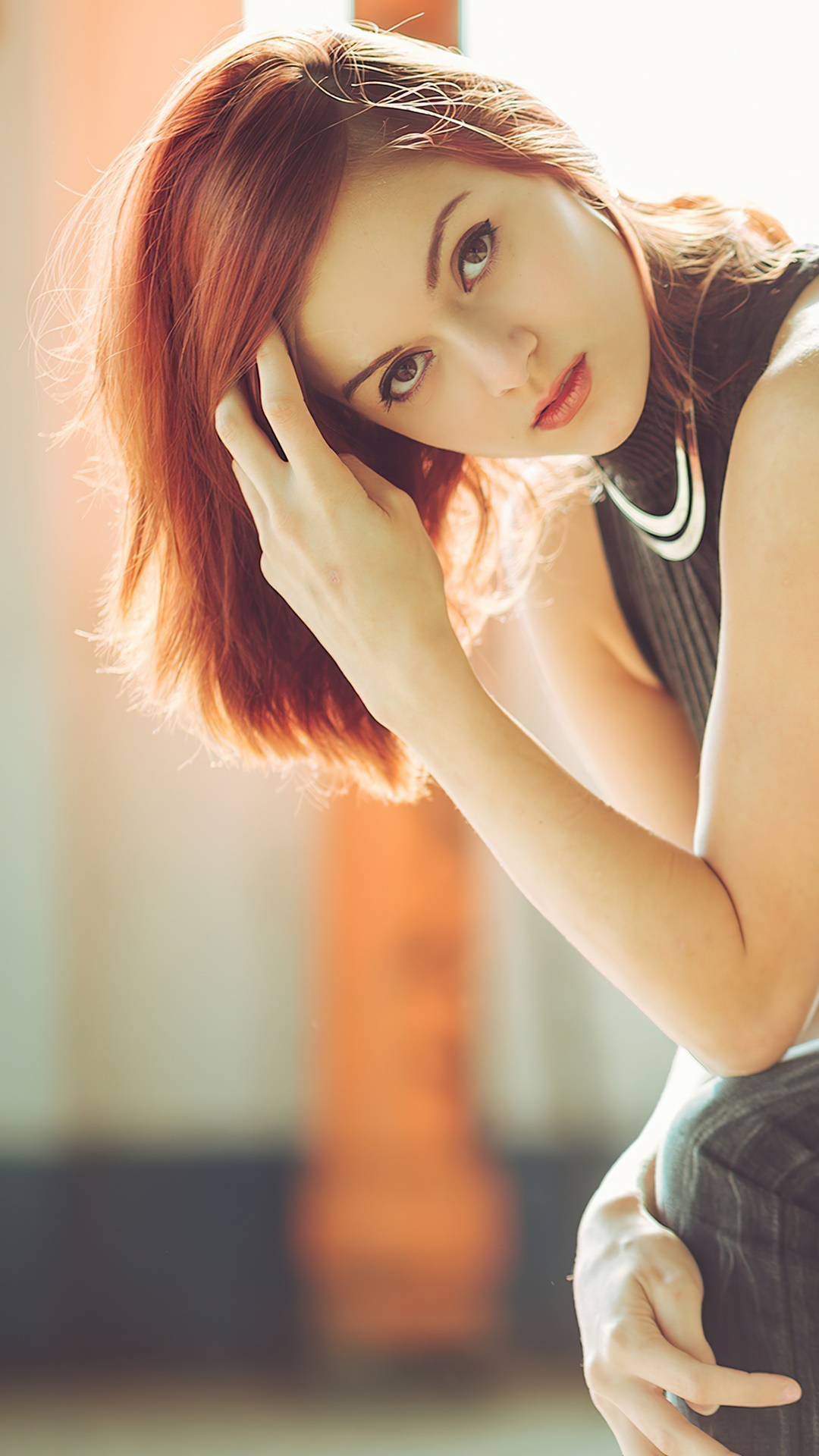 Redhead girl posing with hand in hair HD Phone Wallpaper