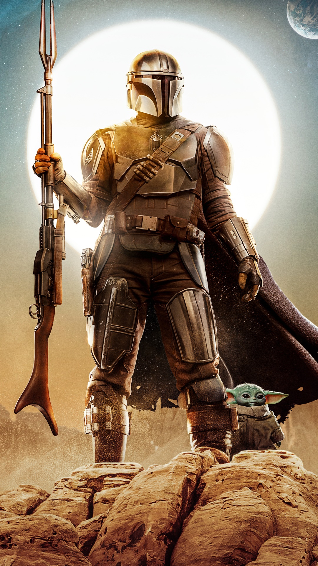 The Mandalorian and Grogu on a rocky planet HD Phone Wallpaper