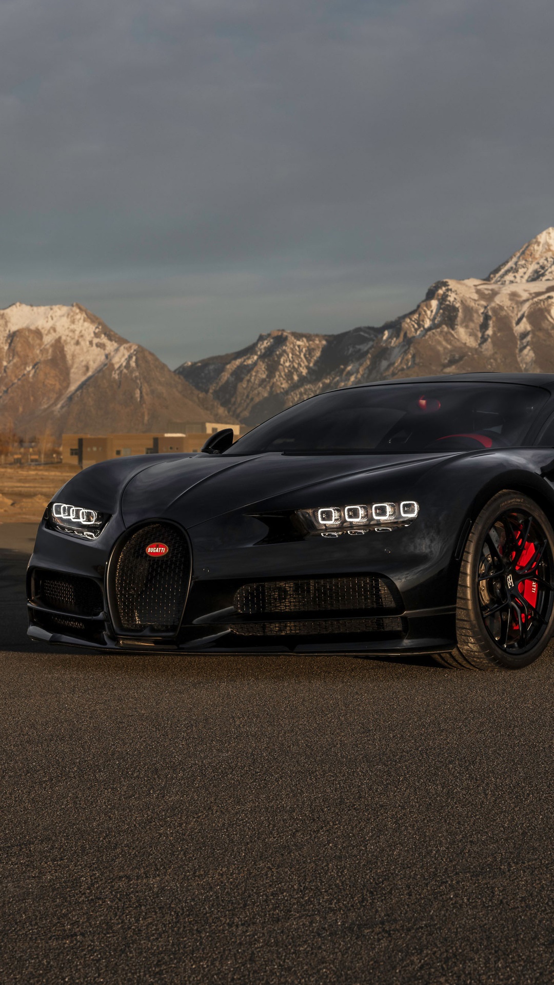 Black Bugatti Chiron with Red Calipers in Mountains HD Phone Wallpaper