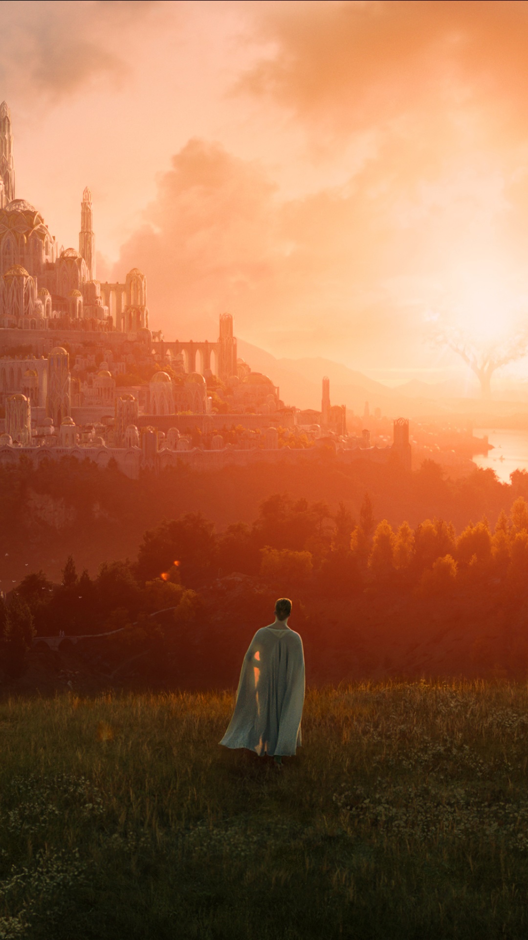 The Rings of Power: A figure gazes at a city at sunset HD Phone Wallpaper
