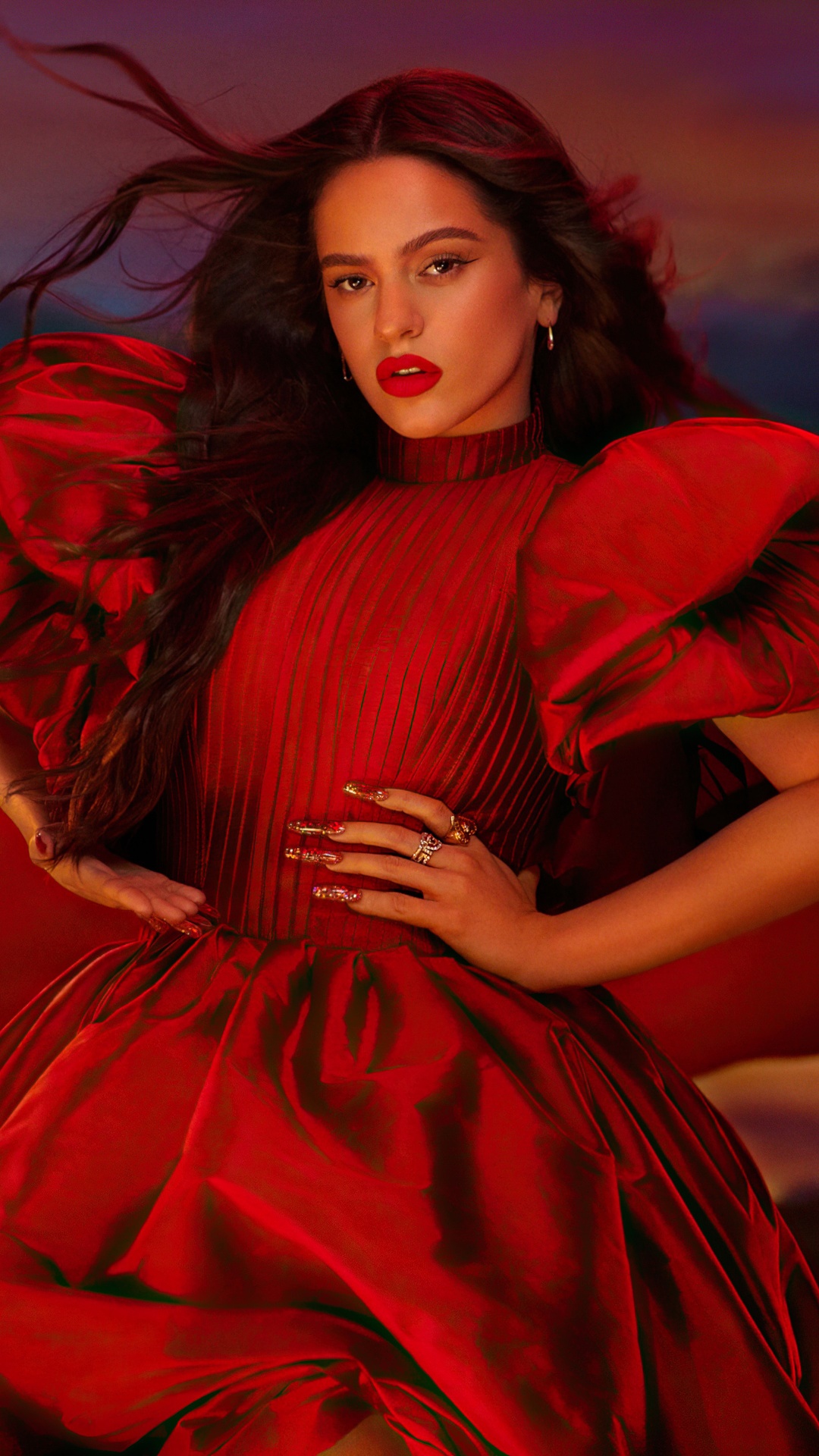 Rosalía in a dramatic red dress HD Phone Wallpaper