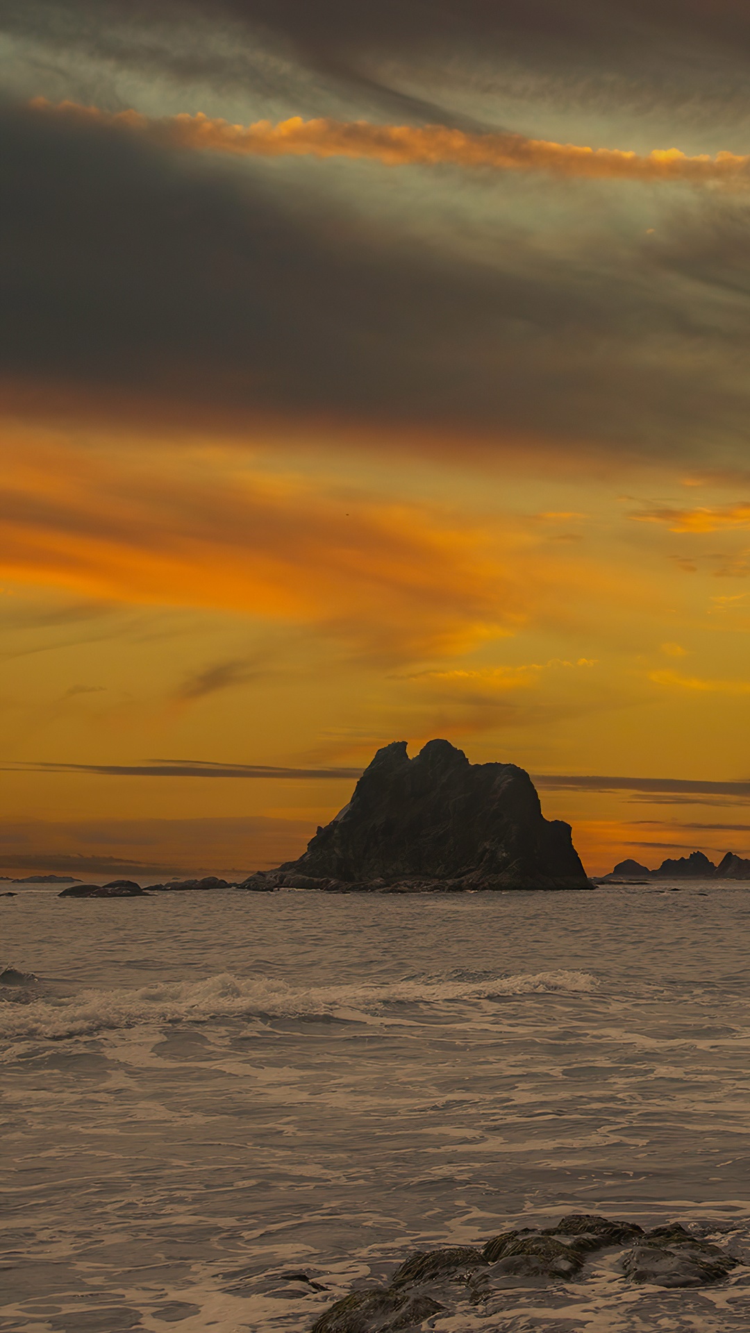 Rocky island in the ocean at sunset HD Phone Wallpaper