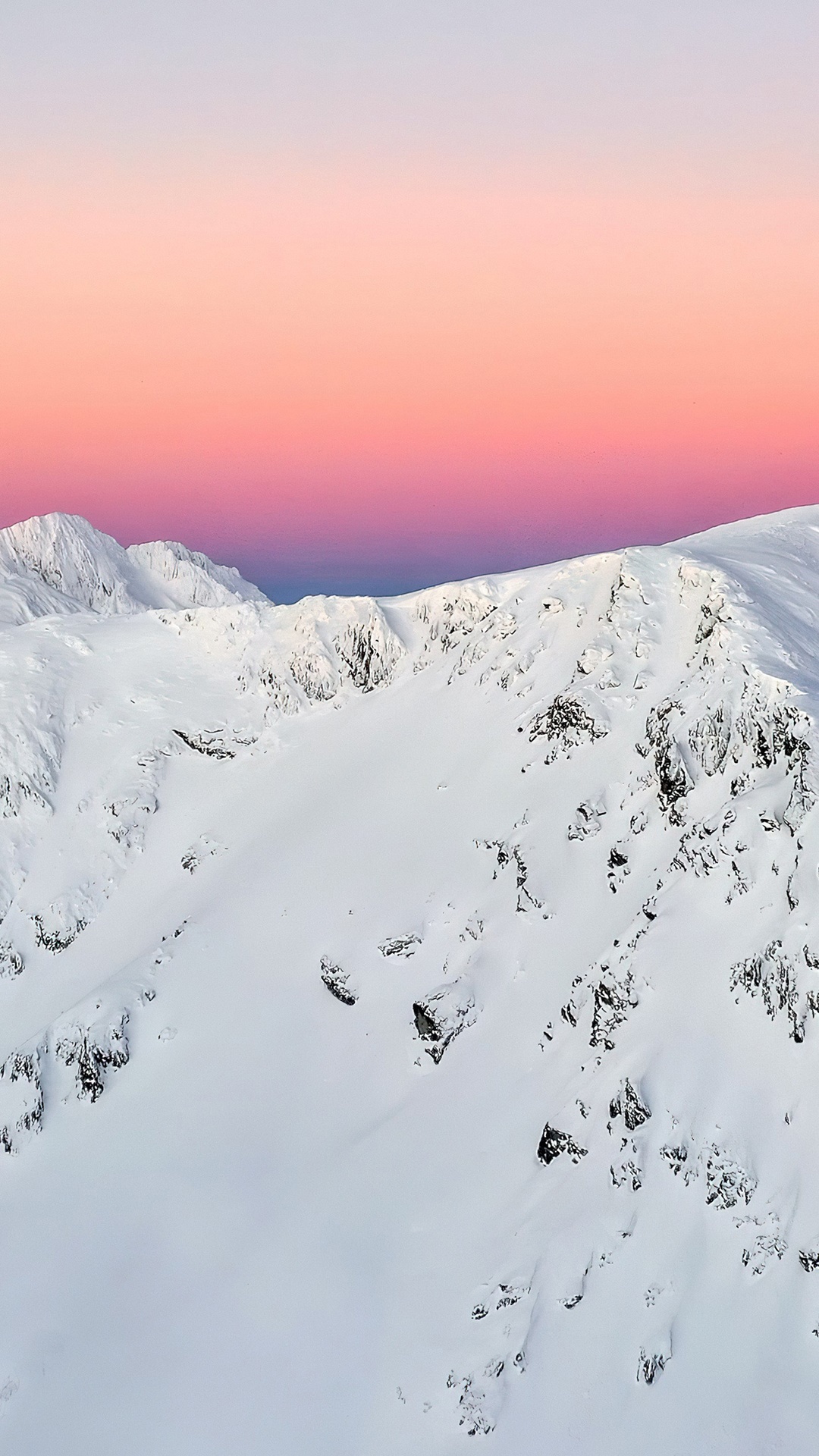 Snowy mountains under a pink and purple sky HD Phone Wallpaper