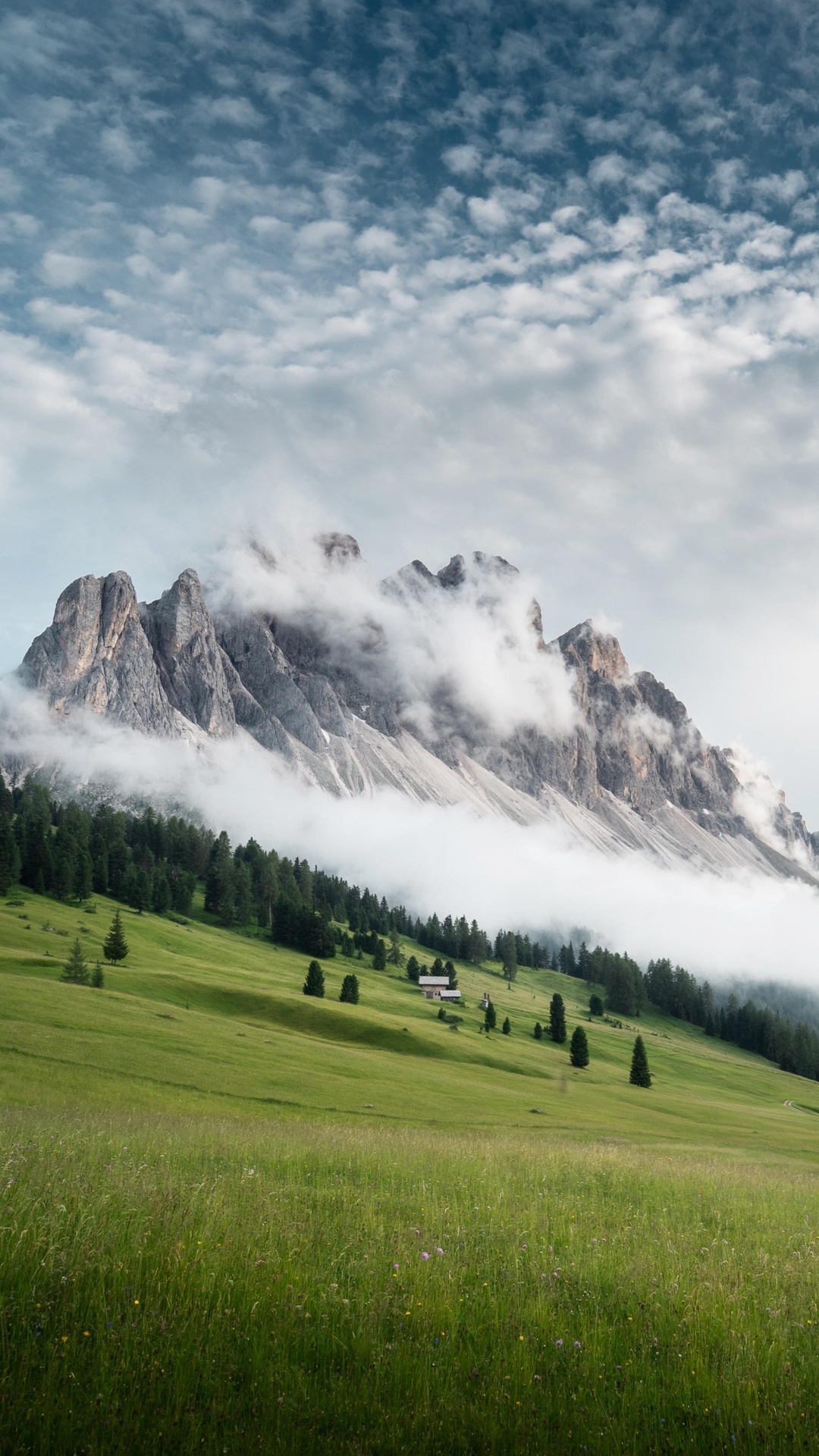 Mountains in Italy with clouds and green fields HD Phone Wallpaper