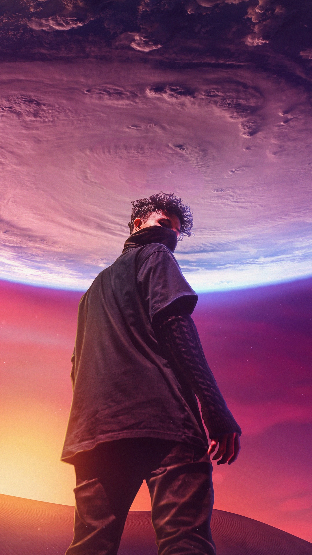 Man in black standing on desert planet with nebula sky HD Phone Wallpaper