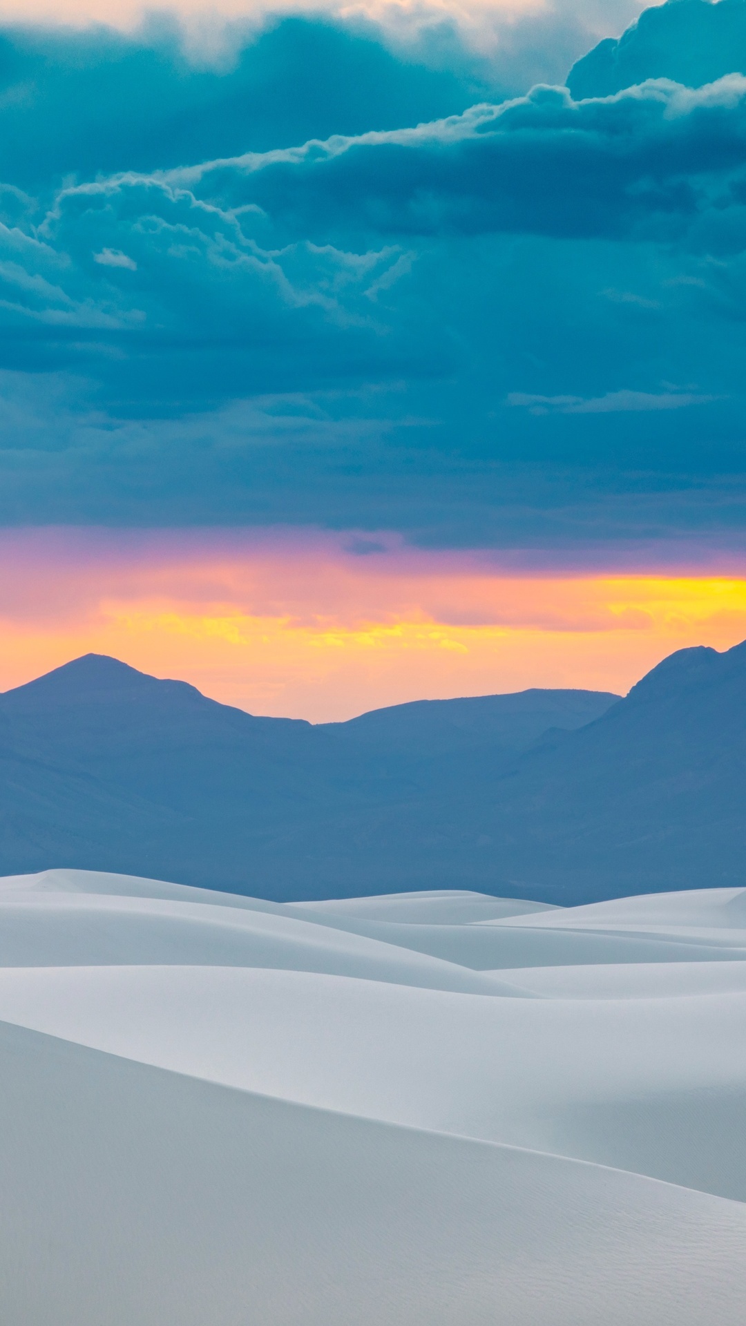White sand dunes at sunset with mountains and clouds HD Phone Wallpaper